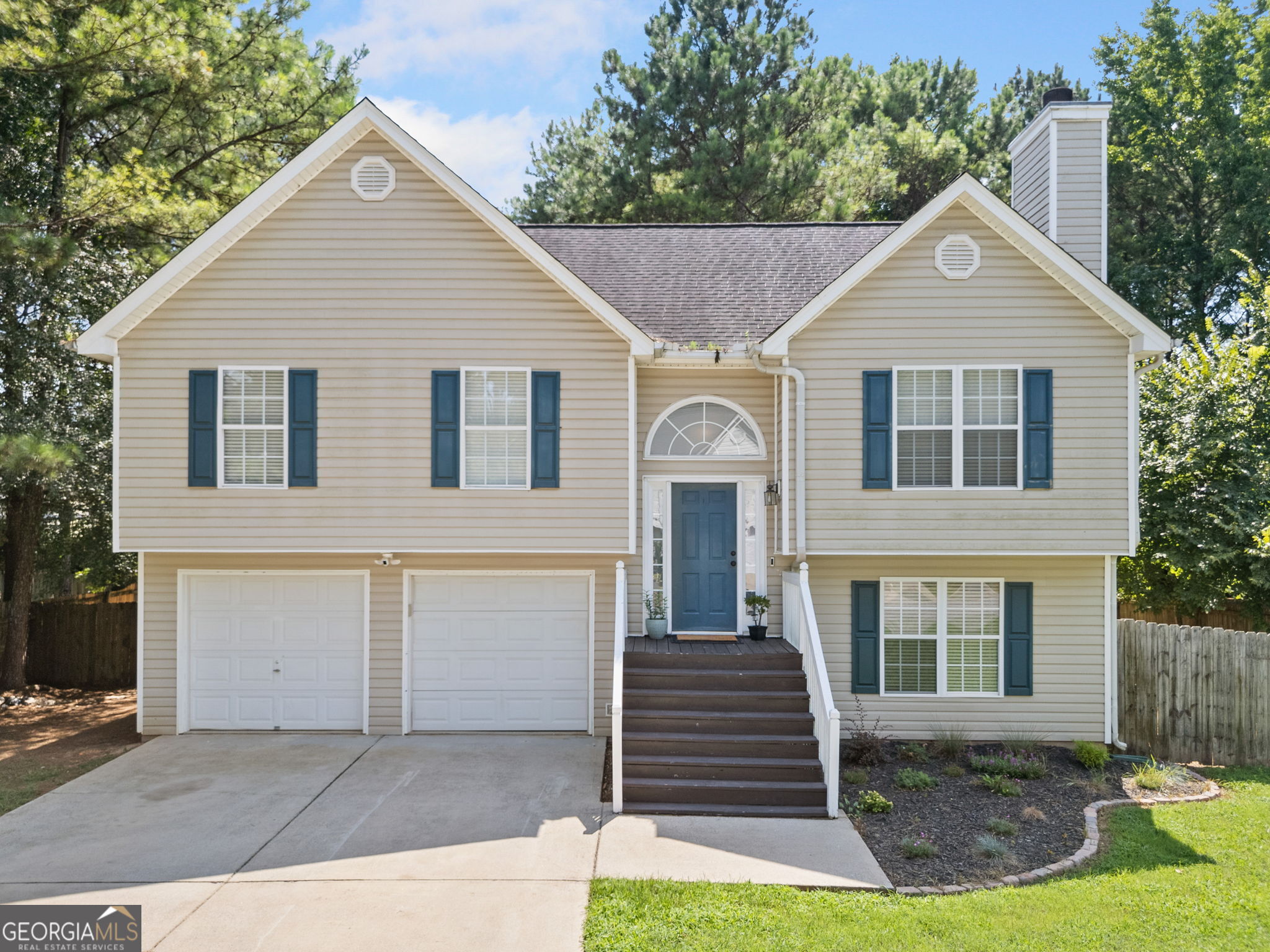 Your search stops right here with this spacious, move-in ready gem featuring a private fenced yard and in-law suite potential, all at an incredible price! This exceptionally maintained split-level home offers the perfect blend of space, comfort, and versatility. As you step inside, a bright and open main living area awaits upstairs, featuring a family room with a cozy fireplace that flows seamlessly into the dining area and kitchen - an ideal layout for both everyday living and entertaining. The kitchen is complete with granite countertops, new stainless-steel appliances (all included!), and freshly painted white cabinetry with modern hardware. Step out from the dining area onto a large deck overlooking a massive, fully fenced backyard - flat, private, and full of potential! Whether it's weekend barbecues, a playground, gardening, or even a future pool, the outdoor space is a blank canvas for your imagination! The upper level also boasts three generously sized bedrooms, including a primary suite with a private en-suite bathroom featuring a soaking tub and separate shower. Downstairs, the fully finished lower level offers in-law suite potential - perfect for extended family, guests, or even rental income. This level includes a second family room, a full bedroom with an en-suite bathroom, and flex rooms that can be used as a home office, gym, or additional storage. Additional highlights include a conveniently located laundry room with brand-new Samsung washer and dryer, fresh interior paint throughout, HVAC system replaced just 2 years ago, newer carpet and flooring, a spacious two-car garage, storage shed for tools and equipment, and all doors freshly sealed with updated, matching knobs and handles throughout. With thoughtful upgrades, a flexible layout, and an incredible backyard, this home truly has it all - and at an unbeatable value! Come see it, and call it Home!