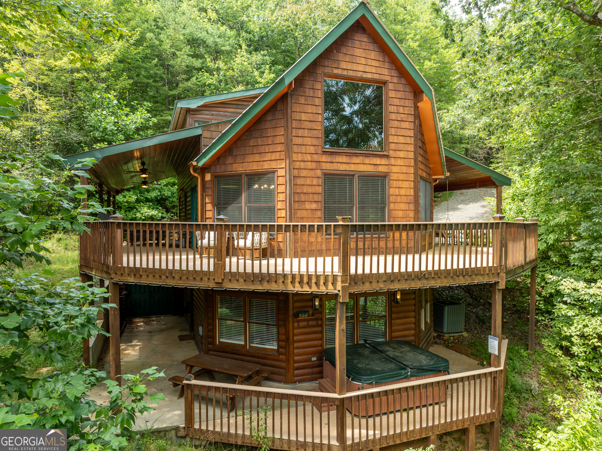 AMAZING UNRESTRICTED OPPORTUNITY FOR ADDITIONAL 2.375 HOMESITE!! "Seller Offering $10,000 For Closing or Rate Buy-Down, ETC." 3.805 TOTAL ACRES In UNRESTRICTED AREA Including That Amazing Additional Lot! NEWLY SURVEYED With MORE Acreage Than Originally thought!! This Stunning Furnished Home Is Situated On A TOTAL Of 3.805 ACRES Including The 2.375 Extra Lot For Building On or To Sell For Extra Income.. GREAT INVESTMENT POTENTIAL!! Seller Is Currently Enjoying A Lucrative SHORT TERM RENTAL Income When Not Using It For Themselves. Terrace Level Features A Game Room With Extra Bed And Bath Walking Out To Covered Patio With Built In Storage, Hot Tub & Firepit. VERY PRIVATE & Just Around Ten Minutes From Downtown Blue Ridge With Mountain Views To Enjoy Along The Way.