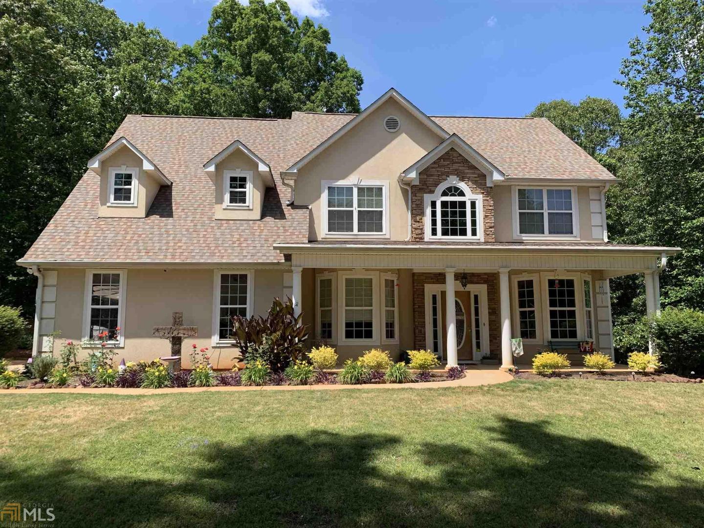 Back on Market! Lovely home nesteld on a quiet, wooded one acre lot. This spacious move in ready home with over 2700 sq ft has everything a young family is looking for! Features include a large, must see master suite and bath, huge kitchen any chef would love, that opens to the cozy family room, perfect for movie night! Other great features include three oversized secondary bedrooms, breakfast area, separate dining and living rooms and an extra room on the main that could be that 5th bedroom/office or playroom. Also, this home has a nice front porch where you can sit and rock away the warm quiet summer days. Dont miss this one, buyers will love it! Please show and lets make a deal! USDA Eligible!