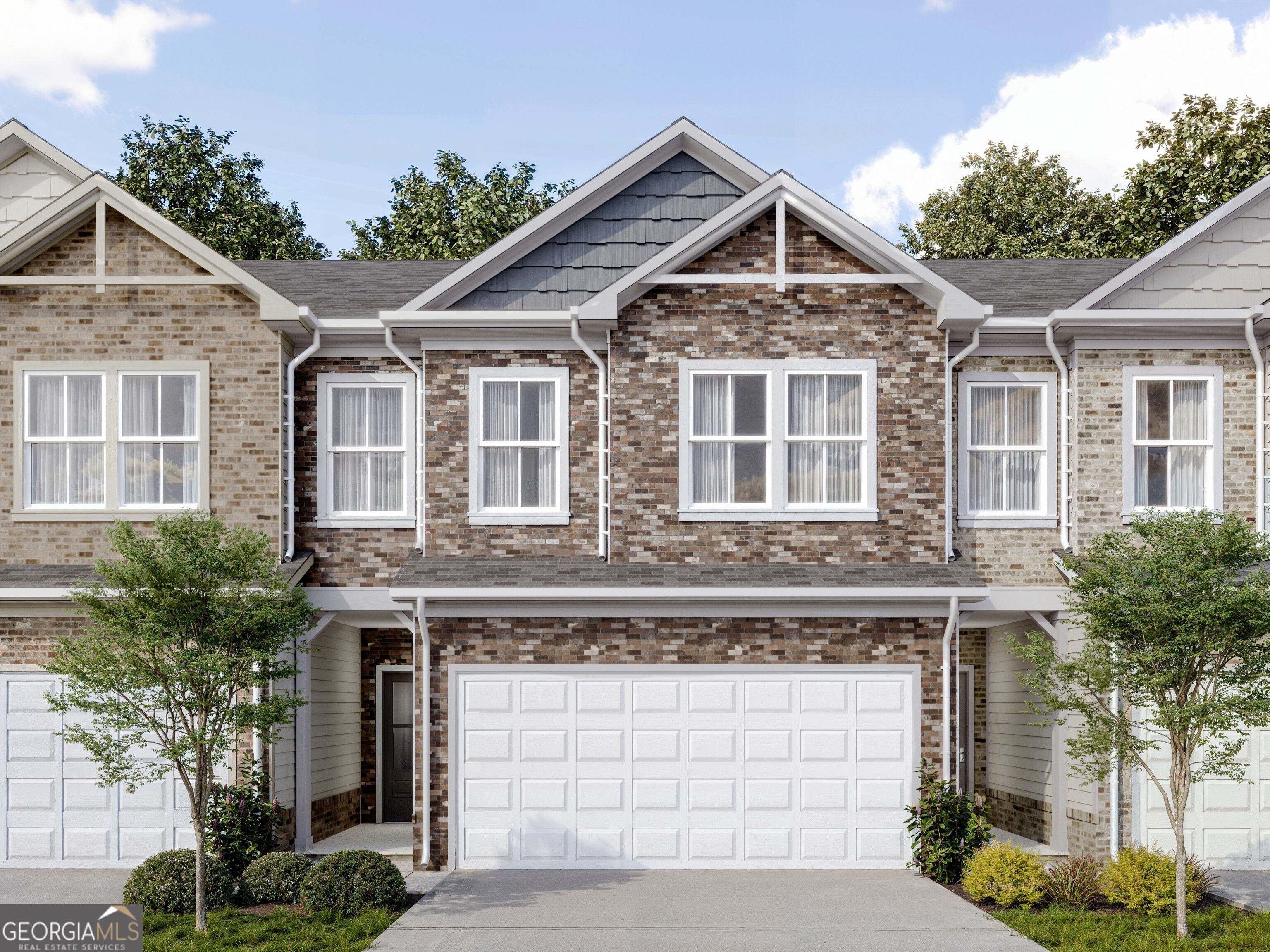 Lot 52 Weston Middle Unit- Ready early late fall- Welcome to the Weston Floor Plan-a beautifully designed townhome offering timeless style and modern comfort. This all-brick front home delivers energy-efficient all-electric living paired with thoughtful design throughout. Step inside from the charming covered front porch into a warm and welcoming foyer. The open-concept main level seamlessly connects the kitchen, dining, and family room, creating the perfect space for entertaining or everyday living. Enjoy smooth surface flooring, a ceiling fan in the family room, and access to a covered rear patio-ideal for relaxing, container gardening, or creating your own peaceful retreat. A convenient powder room and two-car garage complete the main level. Upstairs, you'll find three spacious bedrooms and two full baths, including the standout Weston primary suite. Enjoy a tray ceiling, ceiling fan, and an oversized walk-in closet that connects directly to the laundry room for added ease. The primary bath features a double vanity and a window for beautiful natural light each morning. Modern features, smart layout, and stylish details make the Weston a perfect place to call home. Don't miss your chance to tour this brand-new floor plan in one of Dacula's most exciting communities!