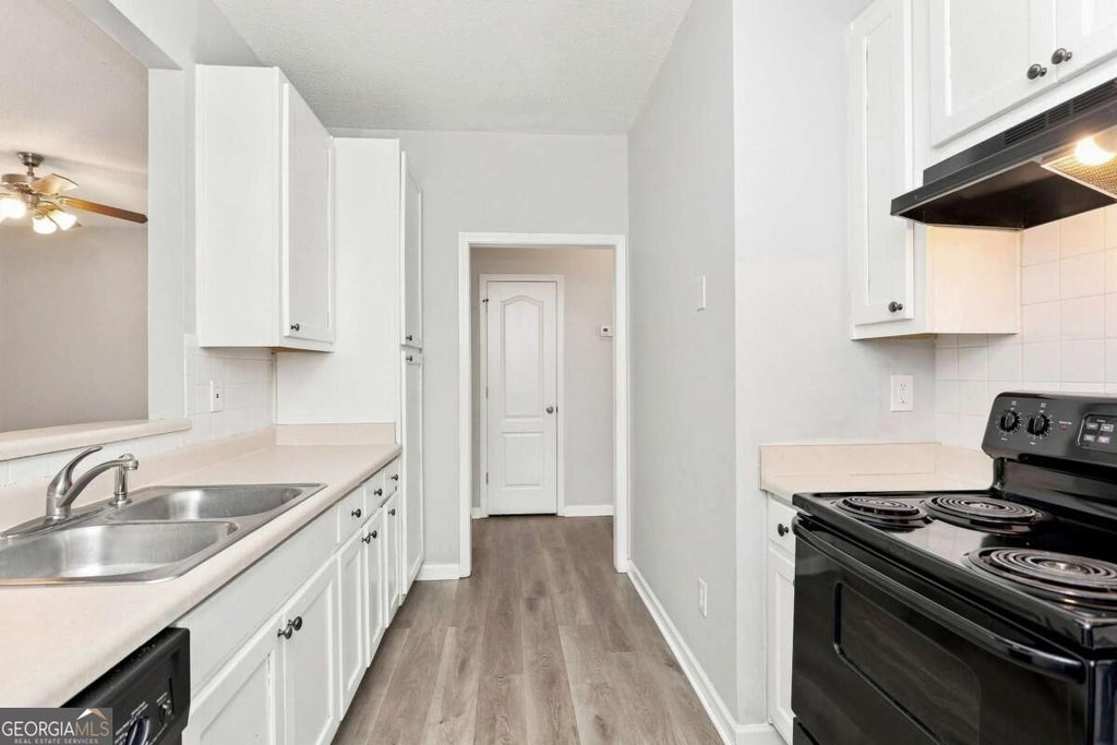 Photo of 8641 Thomas Lane, Riverdale, GA 30274 (MLS # 10845915)
