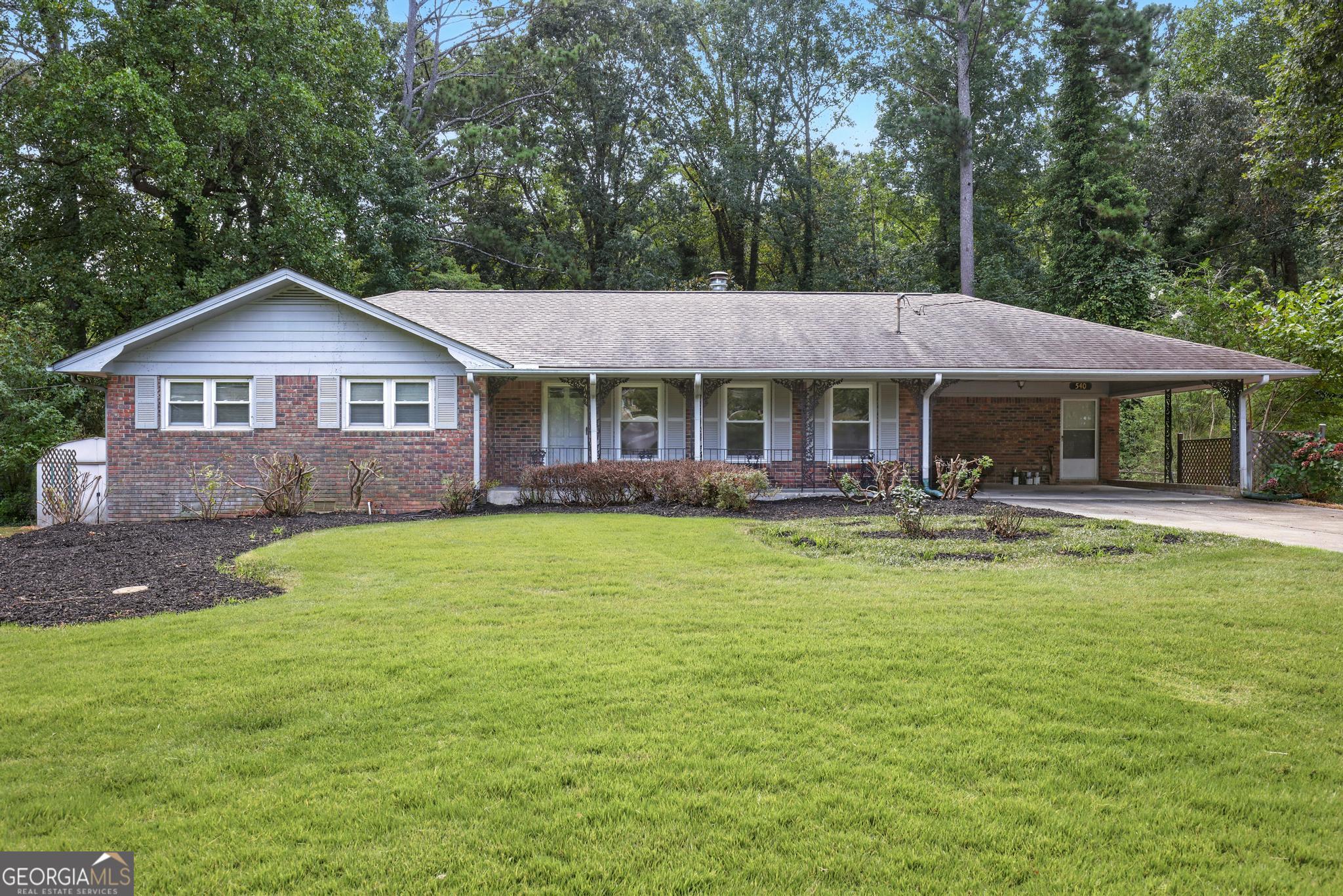 Charming 1968 brick ranch nestled on a private lot featuring 4 spacious bedrooms and 3 full bathrooms. This timeless home boasts a full finished basement, offering additional living and entertainment space. Enjoy serene views and outdoor relaxation in the fully fenced backyard, complet with a peaceful fresh water stream. Perfect for gatherings or quiet moments, this property blends classic charm with modern comforts.