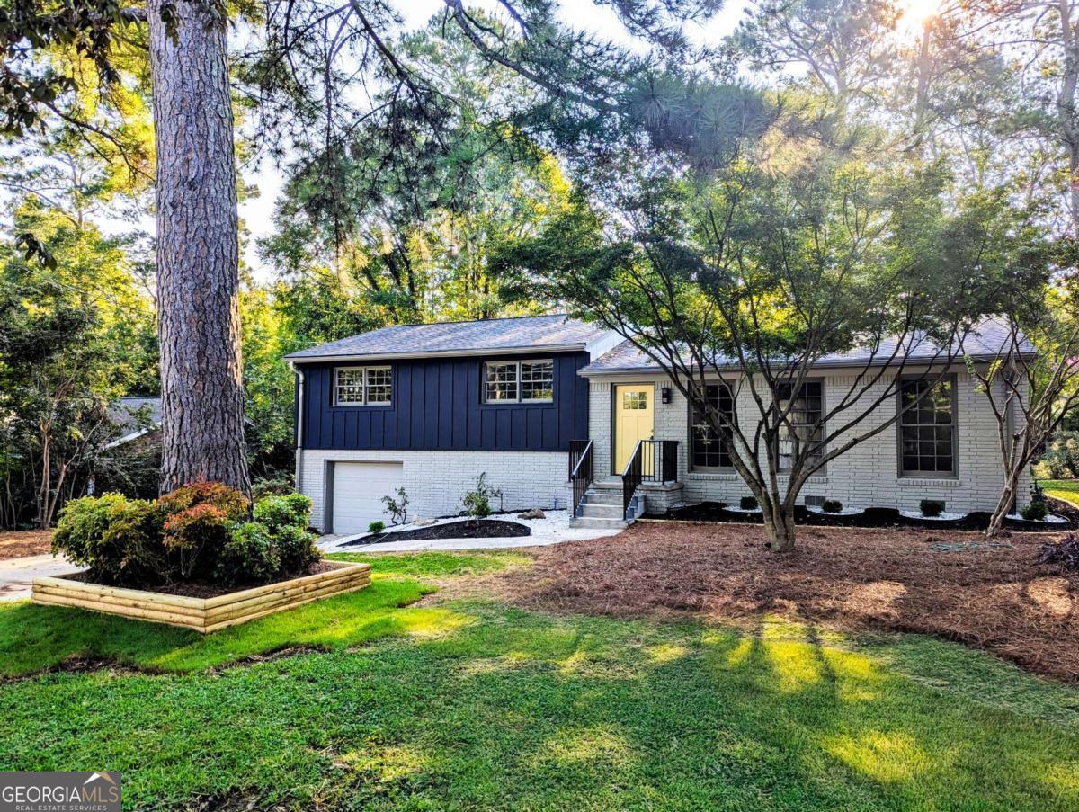 Step into a home that feels brand new in one of East Cobb's most connected and vibrant locations, just minutes from everything Marietta, GA 30067 has to offer. This renovated, move-in ready 3-bedroom, 2-bath single-family home offers the perfect blend of modern style, thoughtful upgrades, and everyday convenience, designed for families who want it all. Just a short 5-minute walk to Brumby Elementary and East Cobb Middle School, and zoned for Wheeler High School, one of the top-rated schools in Cobb County, it's an ideal fit for families looking for top educational options. Enjoy easy access to recreation with Terrell Mill Park only 0.5 miles away, offering soccer fields, tennis courts, playgrounds, and picnic areas, and connect with nature just 1.5 miles away at Sope Creek Paper Mill and its scenic trails. For shopping, dining, and entertainment, you're less than 15 minutes from The Battery Atlanta, and all your daily essentials are just minutes away. Inside, the home features a brand-new roof, HVAC system, and water heater. You'll fall in love with the brand-new flooring, fresh interior and exterior paint, and the completely remodeled kitchen with white cabinets, quartz countertops, stylish tile backsplash, and new stainless steel appliances. The bathrooms have been fully upgraded with modern tile work, quartz double vanities, and updated light and plumbing fixtures. With a spacious layout, fenced backyard, and convenient access to parks, schools, and entertainment, this is the updated East Cobb home for sale you've been waiting for. Schedule your private tour today and experience the perfect blend of comfort, style, and East Cobb living!