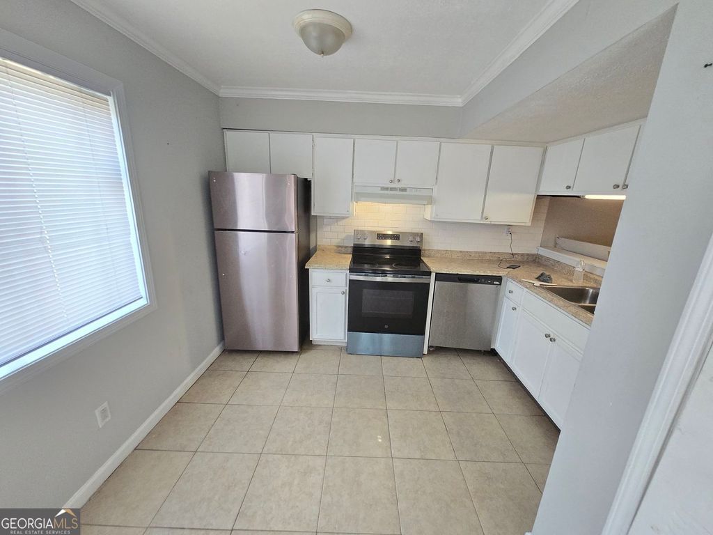 Photo of 6073 Regent Manor, Lithonia, GA 30058 (MLS # 10742075)