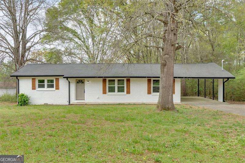 Based on previous feedback we removed from market and replaced the roof with new architectural shingles, added structural support to roof and leveled the floor in the living room! Modern updates meet country charm! This beautifully renovated 3 bedroom, 2 bath home is nestled in a peaceful setting and has been thoughtfully updated from top to bottom. Step inside and fall in love with the bright, open floorplan that offers both comfort and functionality. The brand-new kitchen is a true showstopper, featuring white shaker cabinets, elegant quartz countertops, stainless steel appliances, and a convenient pantry - perfect for both everyday living and entertaining. The updated bathrooms boast stylish fixtures and finishes, while new flooring throughout adds a fresh, cohesive feel to every room. Enjoy peace of mind with major upgrades already completed: new windows, new water heater, updated electrical, and fresh interior and exterior paint make this home truly move-in ready. A separate laundry room provides added convenience and storage space. Don't miss your chance to make this beautifully updated home your own.