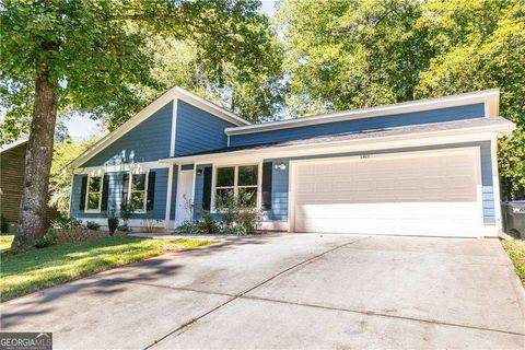 Photo of 1411 Indian Way NW, Lilburn, GA 30047 (MLS # 10597926)