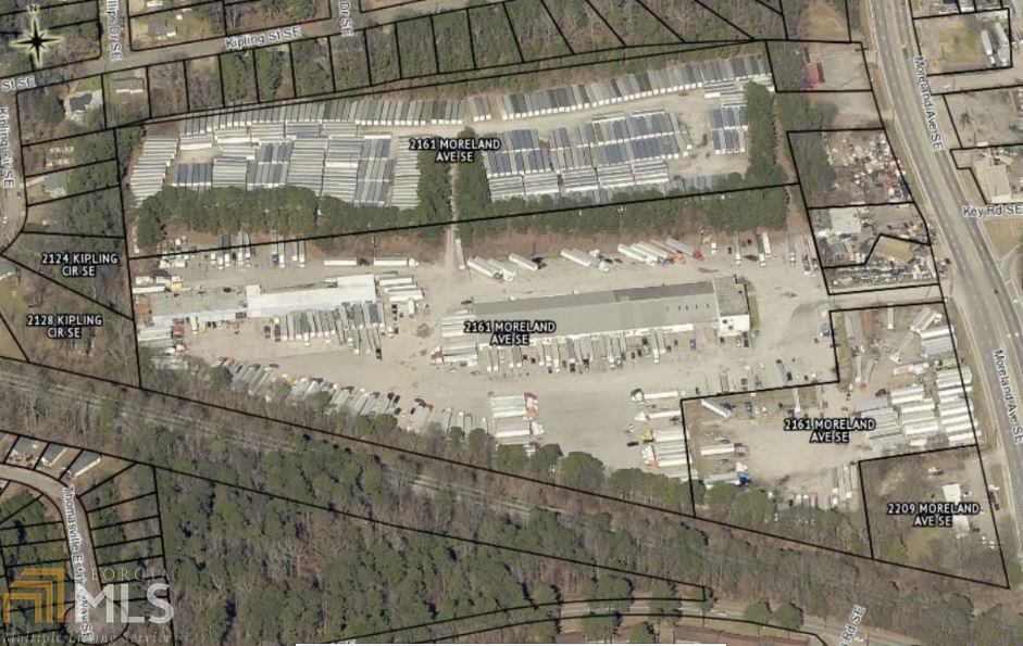 ATLANTA - Excellent value-add opportunity 26.7 acres |Truck Terminal & Logistic Parking. 2161 Moreland Ave SE Atlanta, GA 30315 26.7 Acres  1,163,052 SF Warehouse space - 95,500 RSF Asking $88-107 (psf) The property includes a 78,000 sf Main warehouse, 6,500 sf of office space, and a 12,000 sf secondary warehouse with 22 roll up bays. Expansive parking areas with 18 acres of paved parking and 9 acres of gravel parking Completely fenced lot with security wire and lighted and monitored grounds State of the art surveillance and security system (biometrics finger scanner) with guard shack Adjacent to Norfolk Southern Railway Only 1.7 miles from I-285 and just 3.5 miles I-20 Within 8 miles of Atlanta Hartsfield Jackson International Airport  Multiple Tenants   [ Diesel's Auto and Truck, LLC] 8 bay diesel auto and truck repair - month to month [ Vacant $2500/month] 3 bays oil pits bldg. B - month to month [ Truck Fiberglass Repair, LLC] Truck paint and body shop in the back-building - month to month (Xtra Leasing) 10 acres on top of the hill park and rent trailers lease option October 2021 [ RP Trailer and Tire Repair Trailer and tire repair 3 acre on the hill to - month to month    Terminal trucking parking 270+ trucks parking $175/month 2019 Business evaluation $1,080,000 business $70,000 a month A contract with Amarok 3-year lease Jan 1, 2022, they built and maintain the fence pay for the fencing services biometrics facial recognition