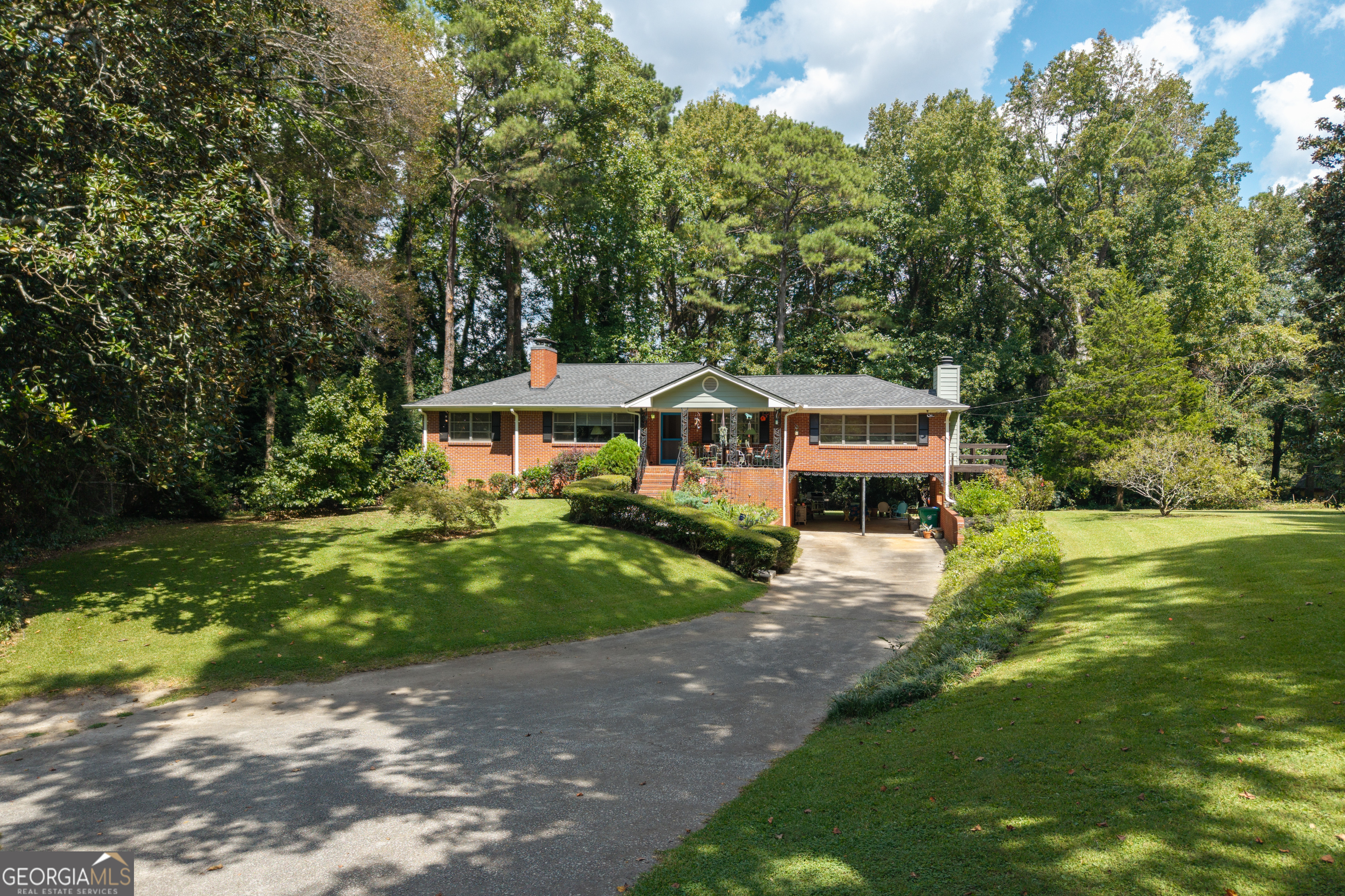 Welcome home to 1004 Milam Circle, where two full acres await you on one of Clarkston's most sought-after streets inside I-285. This solid all-brick home offers a wonderful layout with a spacious, window-filled den and fireplace, a formal living room with its own fireplace, and a separate dining room off the eat-in kitchen overlooking the gorgeous backyard. The home has been lovingly cared for and features a finished daylight room in the basement that can be used as a living space, bedroom or both with en suite bath-perfect as a rental option or guest suite. The outdoor sanctuary includes a back deck, gazebo, and expansive yard with room to garden, entertain, or simply enjoy quiet moments on the front porch perched at tree level. Do you love gardening? Well, here is the land for that! Lots of open space and sunlight. The trees and plants love it here. The owners have planted and maintained cedar trees, a japanese maple and japanese magnolia, Georgia magnolia trees, fig and willow trees, butterfly bushes, gardenias lilies, jasmine and more. A huge bonus: the lot is subdividable, with a recent survey already completed and available with listing documents. This means you can keep the full two acres for yourself or create an additional buildable lot-an incredible opportunity for investors or homeowners alike, especially with new construction already happening on the street. Zoned for Druid Hills High and Middle and Avondale Elementary, all offering the International Baccalaureate program, this home also puts you close to the PATH trail, Clarkston shops and restaurants, Dekalb Farmers Market, and just minutes from Avondale Estates and Decatur. 1004 Milam Circle is not only a home but a chance to become part of a welcoming community-one of Clarkston's best-kept secrets.