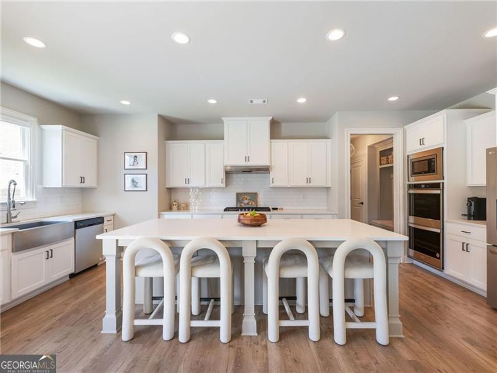 Photo of 7408 Whistling Duck Way, Flowery Branch, GA 30542 (MLS # 10714703)