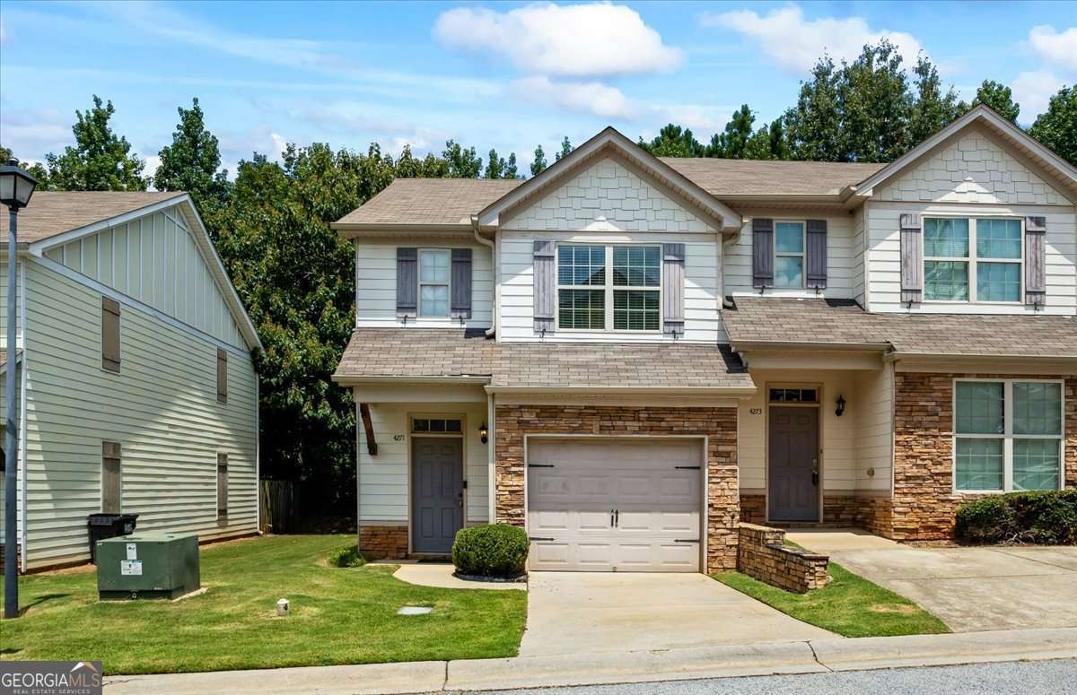 Welcome to this beautifully upgraded 3 bedroom, 2.5 bath end unit nestled in gated community of Highwood Park. This home has been thoughtfully renovated from top to bottom featuring rich solid oak hardwood floors, stainless steel appliances and modern lighting throughout, creating a warm and inviting space. Enjoy a spacious, open layout with a convenient half bath on the main level and bedrooms upstairs, offering plenty of space to relax or work from home. The bathrooms have been tastefully redesigned with premium tilework, custom vanities, and sleek chrome fixtures for a spa-like feel. Additional perks include a 1-car garage, and best of all no rental or leasing restrictions; making this a fantastic option for investors or first-time homebuyers alike. Ideally located just minutes from Hartsfield-Jackson Airport, Camp Creek Marketplace, Atlanta Metro Studios, and GICC, this home offers convenience, comfort, and exceptional value. Don't miss your chance to own or invest in this turnkey property, schedule your private tour today! * This property is not FHA approved*