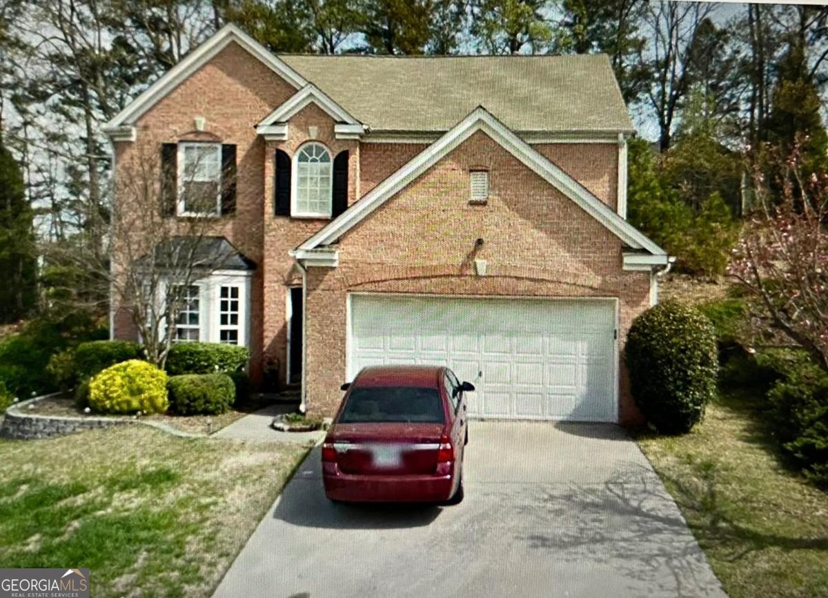 Beautiful house located close to East West Connector. Four bedrooms, 2 1/2 bathrooms. Spacious living room that connects to kitchen. Two-car garage.