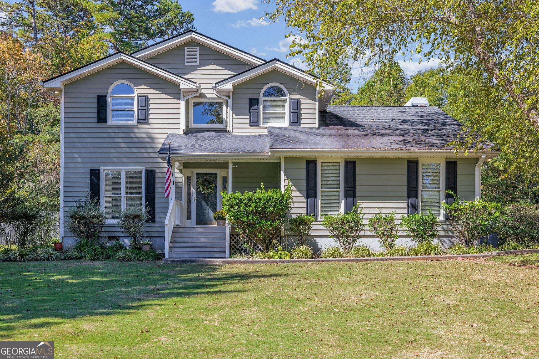 Welcome to this inviting 3-bedroom, 2.5-bath with bonus room Home filled with warmth and charm. The moment you step inside, you'll be greeted by beautiful hardwood floors and a spacious, open floor plan that seamlessly connects the kitchen and living room-perfect for everyday living and entertaining. A bright sunroom offers the ideal spot to relax with your morning coffee or unwind at the end of the day. The separate dining room provides a wonderful space for hosting gatherings with family and friends. Step outside to a stunning backyard with mature trees, a fenced yard, and a cozy fire pit-an outdoor retreat designed for making memories. Plus, enjoy access to a community pool, perfect for cooling off on warm days and connecting with neighbors. This home has all the comforts and character you've been looking for, both inside and out.