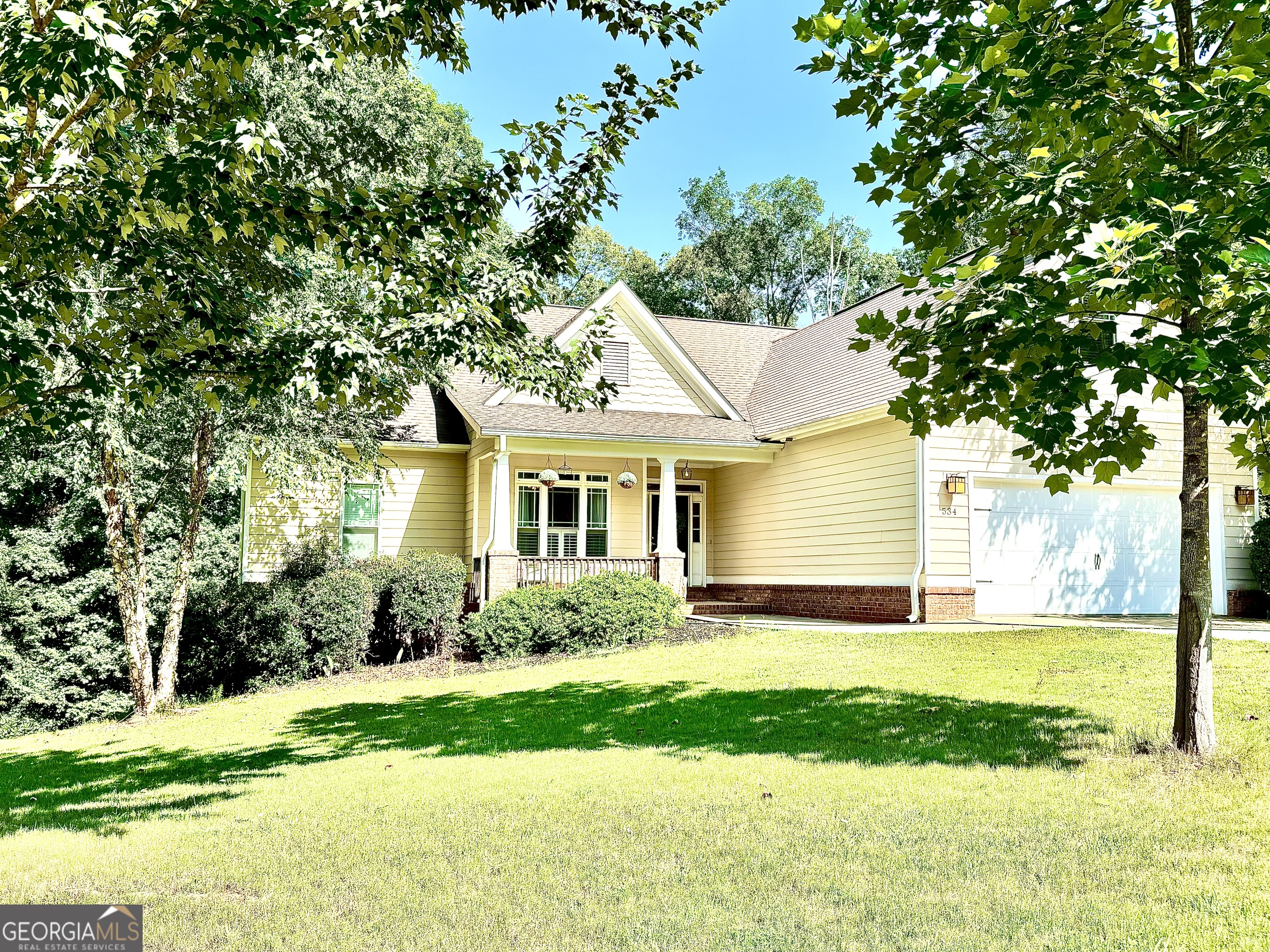 This ranch with personality sits on a spacious .73-acre lot in the Jefferson Walk neighborhood! Inside, it's all about the details: recessed lighting, high ceilings, and beautiful hardwood floors throughout. The main floor keeps life easy with the primary suite and two additional bedrooms, open living spaces that feel bright and airy, a kitchen with custom cabinetry and stainless steel appliances, and a laundry room with a utility sink. Need a little extra room? Head upstairs to the bonus 4th bedroom-ideal for guests, teens, a home office, or hobby room. Outside, unwind on the screened porch and let the pets roam in the fenced yard. The home also features a full daylight, walk-out basement with poured concrete walls and an additional electrical box in the basement for a workshop or future finishing. Additional highlights include a 2-car garage, and a prime location close to groceries, dining, and more. Enjoy neighborhood amenities such as sidewalks, swim, tennis, and a playground, making this a perfect home for all lifestyles. This isn't just a house-it's the next chapter. Schedule a showing today!