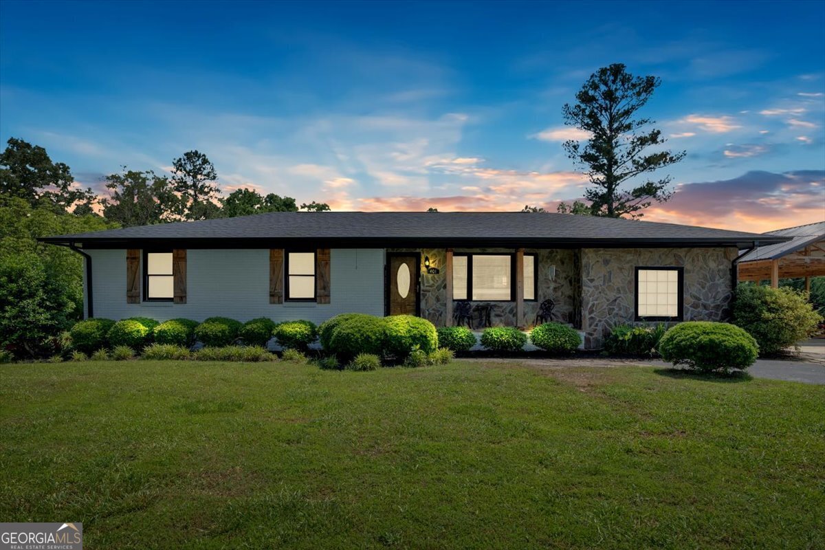 PRICED BELOW APPRAISED VALUE MEANS INSTANT EQUITY! Discover Your Peaceful Oasis In This Stunning Updated Four-Sided German Smeared Brick Ranch, Perfectly Situated On 7.59 Acres! This Charming Home Features Four Spacious Bedrooms And Two Beautifully Updated Bathrooms, Offering Both Comfort And Modern Stye. Step Inside To Find A Cozy Wood-Burning Fireplace That Enhances The Rustic Ambiance Throughout The Home And A Perfect Addition To Your Dining Experience. Gorgeous Hardwood Floors Flow Seamlessly From Room To Room, Providing A Warm And Inviting Atmosphere. The Heart Of The Home Is The Beautifully Updated Kitchen, With New Solid Surface Countertops, Pantry Cabinet, Stainless Steel Appliances And It's Open To The Living Room Allowing You To Entertain Family And Friends While Preparing Meals. Walk Through The Perfectly Aligned Brick & Shiplap Hallway To The Laundry Room Where There Is Room For "Loads" Of Fun! Outside You'll Find Your Own Backyard Paradise, Complete With A Sparkling Pool Surrounded By A Spacious Tanning Deck Perfect For Lounging Under The Sun And Don't Forget Room To Grill And Dine On The Back Patio! This Property Also Boasts A Barn, A Lush Pasture For Livestock Or Gardening And A Workshop For All Your Projects. A 24X40 Carport Is Perfect For Providing Shelter For Cars, Boats Or RV's From The Elements! Experience The Best Of Country Living In This Exceptional Ranch Home, Where Modern Updates Meets Rustic Charm! Schedule Your Appointment Today!