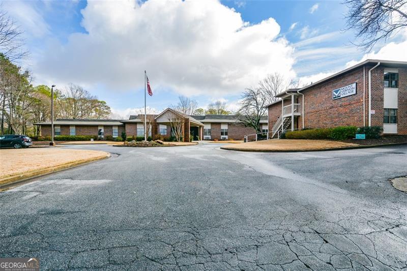 Amazing first floor condo in Active Adult 55+ Independent living community of Mount Vernon Village located in the heart of Sandy Springs. This beautiful 1 bedroom/1 bath home has a covered patio with private entry. Small dogs (under 25 lbs. are allowed on first floor only). Renovated kitchen with granite countertops and stainless steel appliances overlooking the family room with LVP flooring and fresh paint. Primary Bedroom has large walk-in closet, updated bathroom vanity and walk-in shower. HOA includes about $600.00 of food (dinner daily and breakfast Monday-Friday) served in the dining room prepared by a chef, house cleaning 2x a month, valet trash picked up at your door, shuttle service, water, electric, building maintenance, common grounds. Amenities include full-time activities director, on-site salon, 24 hour reception desk, exercise room, game room, theater room, library, coin operated washer/dryer and monthly activities calendar. This location is so convenient to shopping, restaurants, hospitals and interstates. Amazing value for 55+ living.