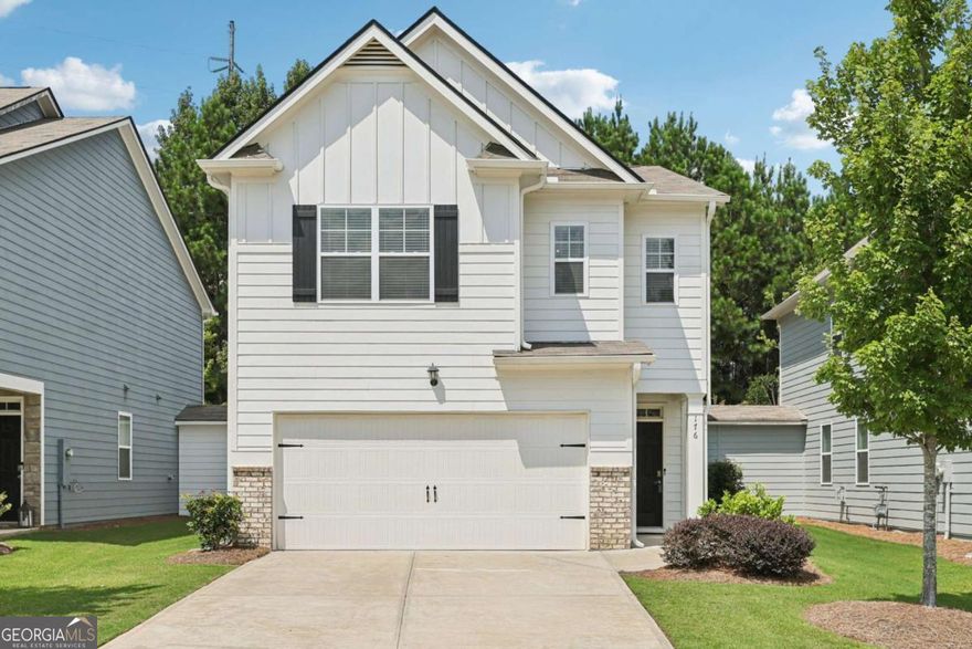 Move-in ready home offering fresh updates and everyday convenience! The main level features beautiful, low-maintenance vinyl wood flooring throughout. Enjoy a bright, open-concept living room with plenty of natural light and a cozy fireplace, flowing effortlessly into the stylish kitchen with a large island with seating, granite counters, stainless steel appliances, and generous cabinet storage. A half bath completes the first floor. Upstairs, the primary suite impresses with a tray ceiling, en-suite bath with dual sinks, soaking tub, separate glass shower, and two walk-in closets. Two secondary bedrooms share a full hall bath, and the laundry room is conveniently upstairs as well! Outside, relax on the spacious patio ideal for grilling and entertaining, plus a private green space backing to woods. Two storage areas provide extra organization! Recent updates include fresh caulking and exterior pressure wash, plus all wood trim painted including fascia, soffits, gutters, and downspouts. Fantastic location near Hwy 92-schedule your showing today! Mortgage savings may be available for buyers of this listing.