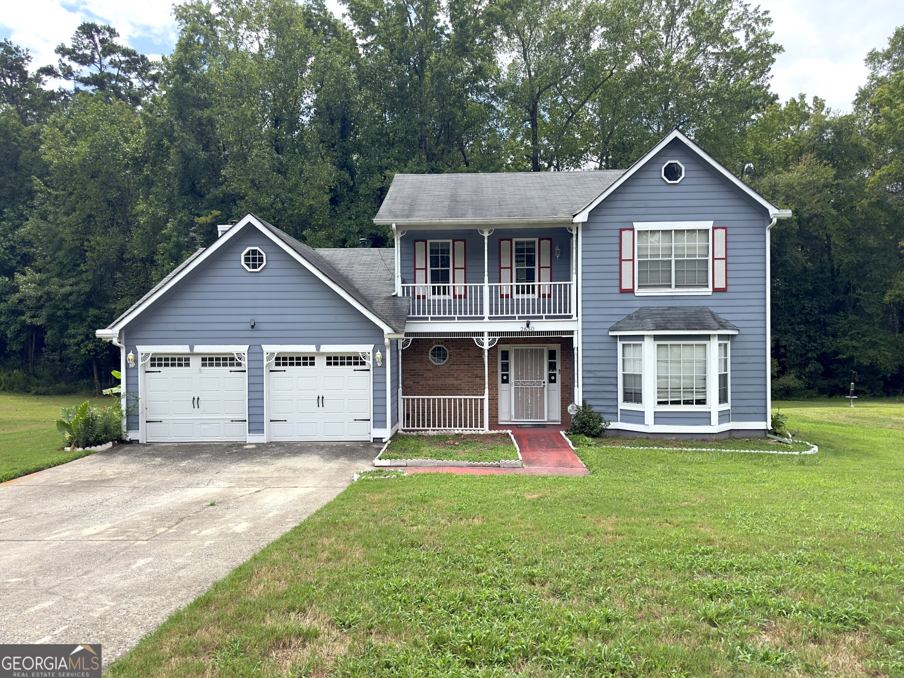 Welcome home to 2650 Ashleigh Downs Lane! A beautifully refreshed 3 bedroom 2.5 bath residence in South Fulton soundly. This turn Key home features a new roof, new hardwood floors, new air conditioning and a new furnace delivering comfort efficiently and peace of mind for years to come.