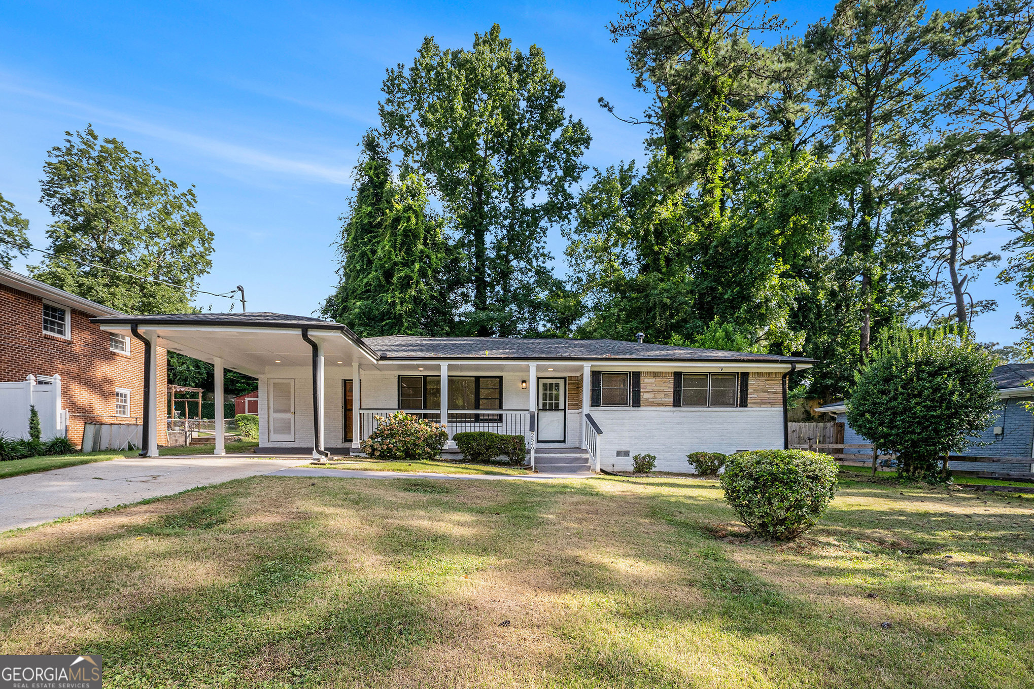 Freshly updated and move-in ready, this all-brick ranch in the heart of Candler-McAfee offers a modern feel with timeless appeal. Each of the three bedrooms has its own full bathroom-perfect for flexible living arrangements or guest comfort. Step inside to an open-concept layout with brand-new flooring throughout and a bright, airy living space that connects seamlessly to the kitchen and dining areas. The kitchen features crisp white shaker cabinets, granite countertops, stainless steel appliances, and a center island ideal for casual meals or entertaining. The primary suite is located on the main level and includes a spacious en-suite with a soaking tub and separate shower. Outside, the large level backyard offers plenty of room for entertaining or simply enjoying the outdoors. Located close to East Atlanta Village, downtown Decatur, local parks, and with easy access to I-285, I-20, and Hartsfield-Jackson Airport, this home combines comfort and convenience. Schedule your tour today and see everything this updated home has to offer.