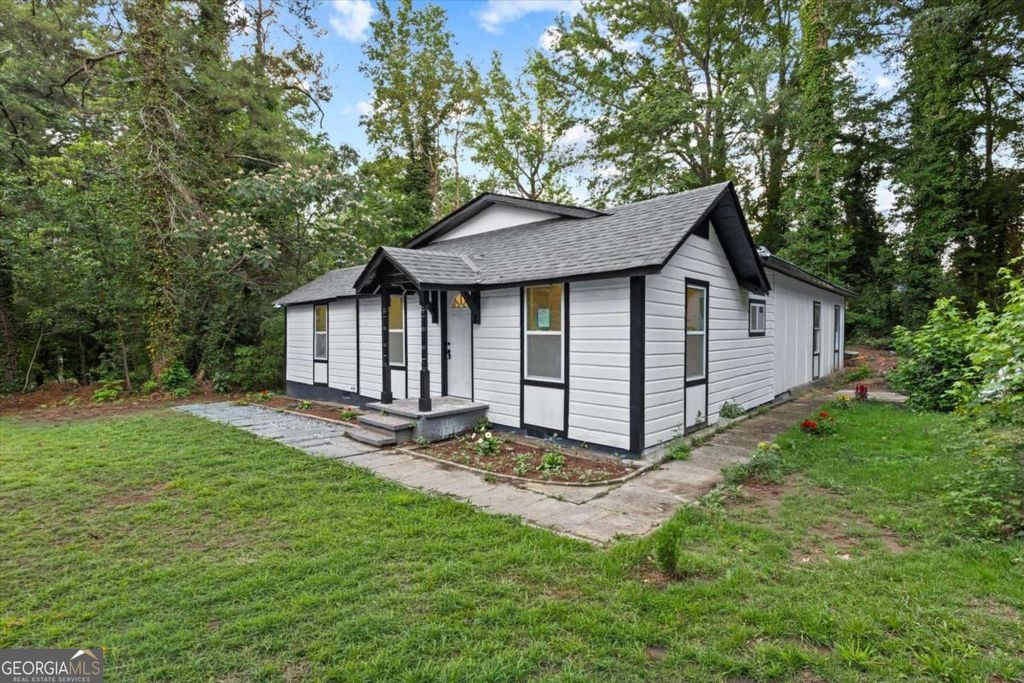 Photo of 4210 Rockbridge Road, Stone Mountain, GA 30083 (MLS # 10784119)