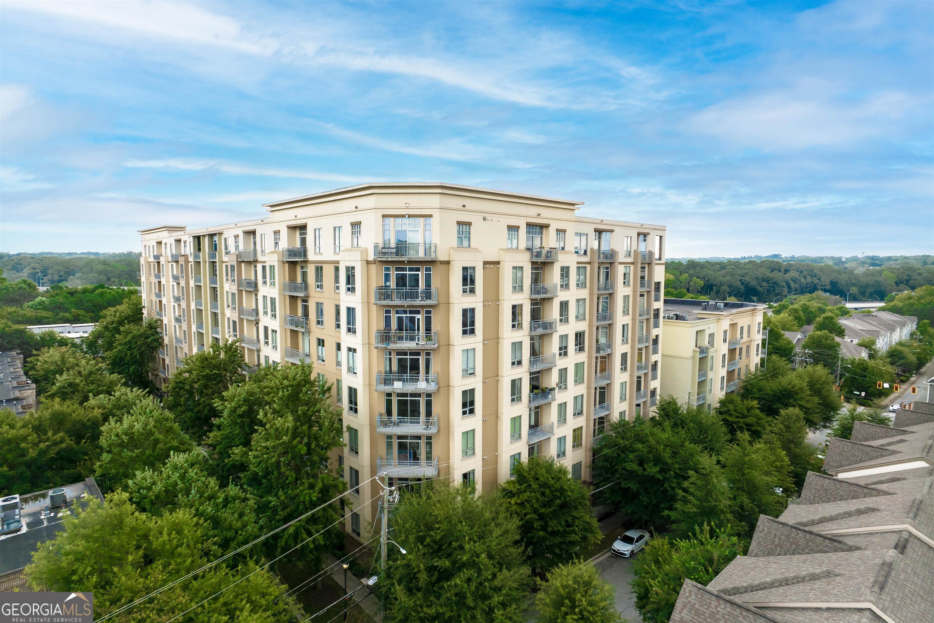 Come see this trendy 1 bed/1.5 bath condo in the desirable Cosmopolitan High Rise Building! Rare unit with Spectacular Atlanta skyline facing views. This condo has it all, hardwood floors throughout, open concept living with modern wood cabinets, granite countertops, S/S appliances, tons of natural light, floor to ceiling windows, walk-in closet with laundry, double vanity, separate tub/shower in master bath, 10ft+ ceilings and cozy balcony to enjoy the amazing city views. Covered parking and a storage unit can be rented. Enjoy the Cosmopolitan state of the art gym facility, 24-hour concierge, business center, clubroom and theater. It is located close to restaurants, the Beltline, Path400, MARTA and shopping!