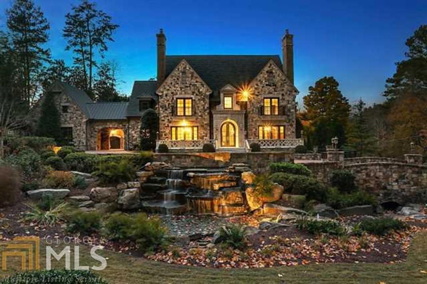Extraordinary in every way! Fabulous 1M price adjustment, this remarkable Buckhead estate with timeless details and exquisite craftsmanship features gourmet kitchen w/ 2 butlers pantries. Main level master wing. 4 additional ensuite bedrooms upstairs. Lower level has home theater, game room, guest quarters, elegant bar, billiard room & office. Separate carriage house, expansive brick motor court, pool house, outdoor kitchen, saltwater pool/spa. Privacy fencing, children's play yard, double gates, massive signature water feature and extensive landscaping.