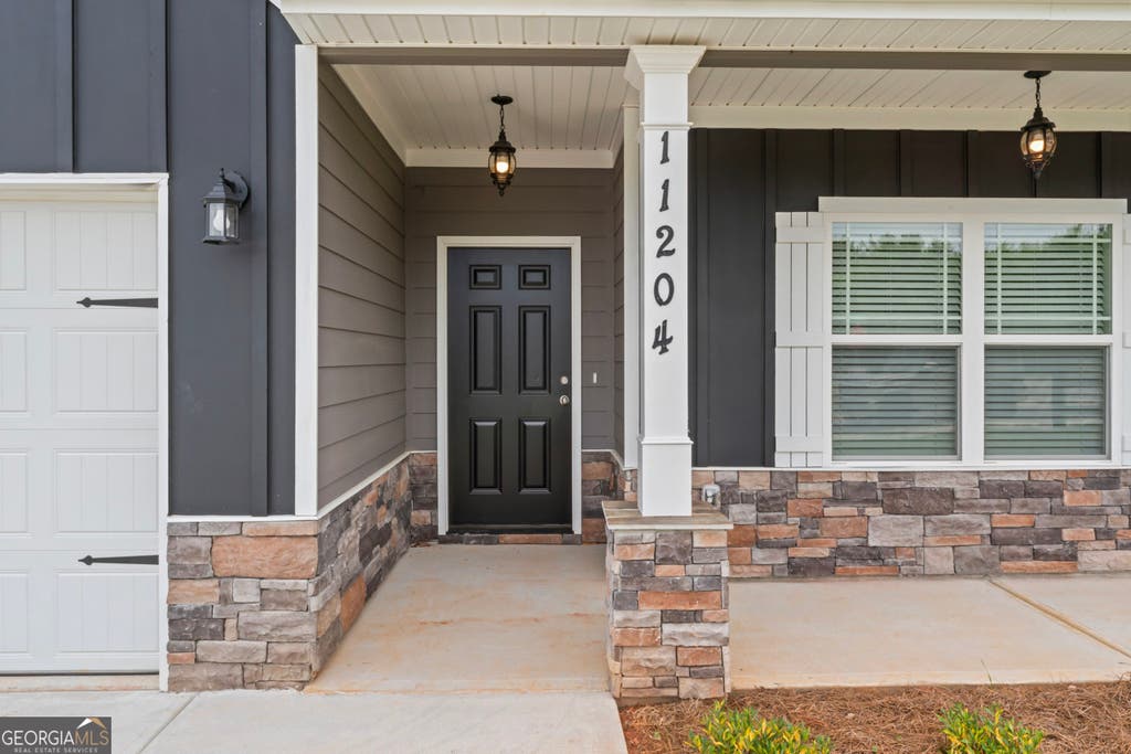Photo of 11153 Cornerstone Way, Hampton, GA 30228 (MLS # 10818752)
