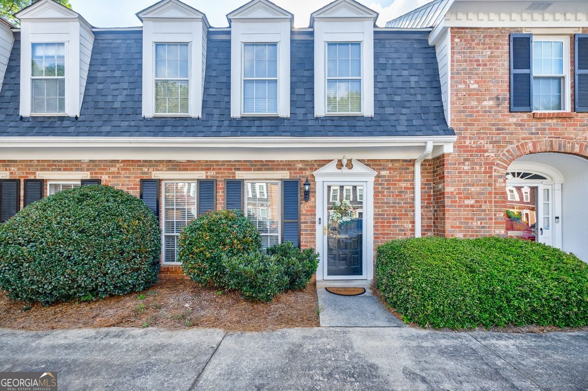 Welcome to your new home in the popular Westover Plantation gated community This move-in ready, well- maintained, and updated townhome features a beautiful kitchen with white cabinetry and countertops and stainless appliances. Plenty of seating in the kitchen/dining area and living room. All with an open concept floor plan and great for entertaining! The patio is private and is enclosed with a wonderful place to grill or sit around a fire pit with friends and family. Two bedrooms upstairs feature a primary and a guest bedroom, both with en-suite bathrooms. Westover Plantation is a wonderful planned community on over 60 acres offering beautiful trees and landscaped gardens. It is just minutes from the heart of Buckhead, West Side, Midtown and Downtown. close to I-75 and I-85 with nearby shopping and entertainment. Residents enjoy resort style living within the complex including two clubhouses, two pools, three tennis courts/pickleball, a dog park, walking trails, EV charging stations and a fitness center. What more can you ask for when looking to call a place your own!