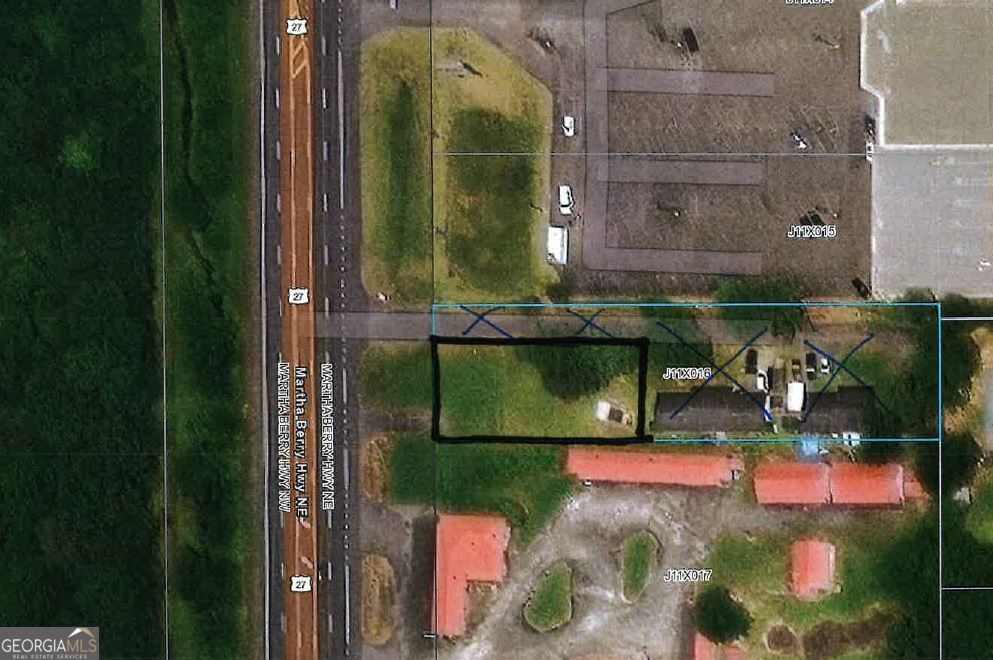 This property is zoned Highway Commercial. Look at the plat in the documents. Tract One is the only tract that is selling which is .2451 acre. Closing must be in 2026. Utilities include power, water & sewer.