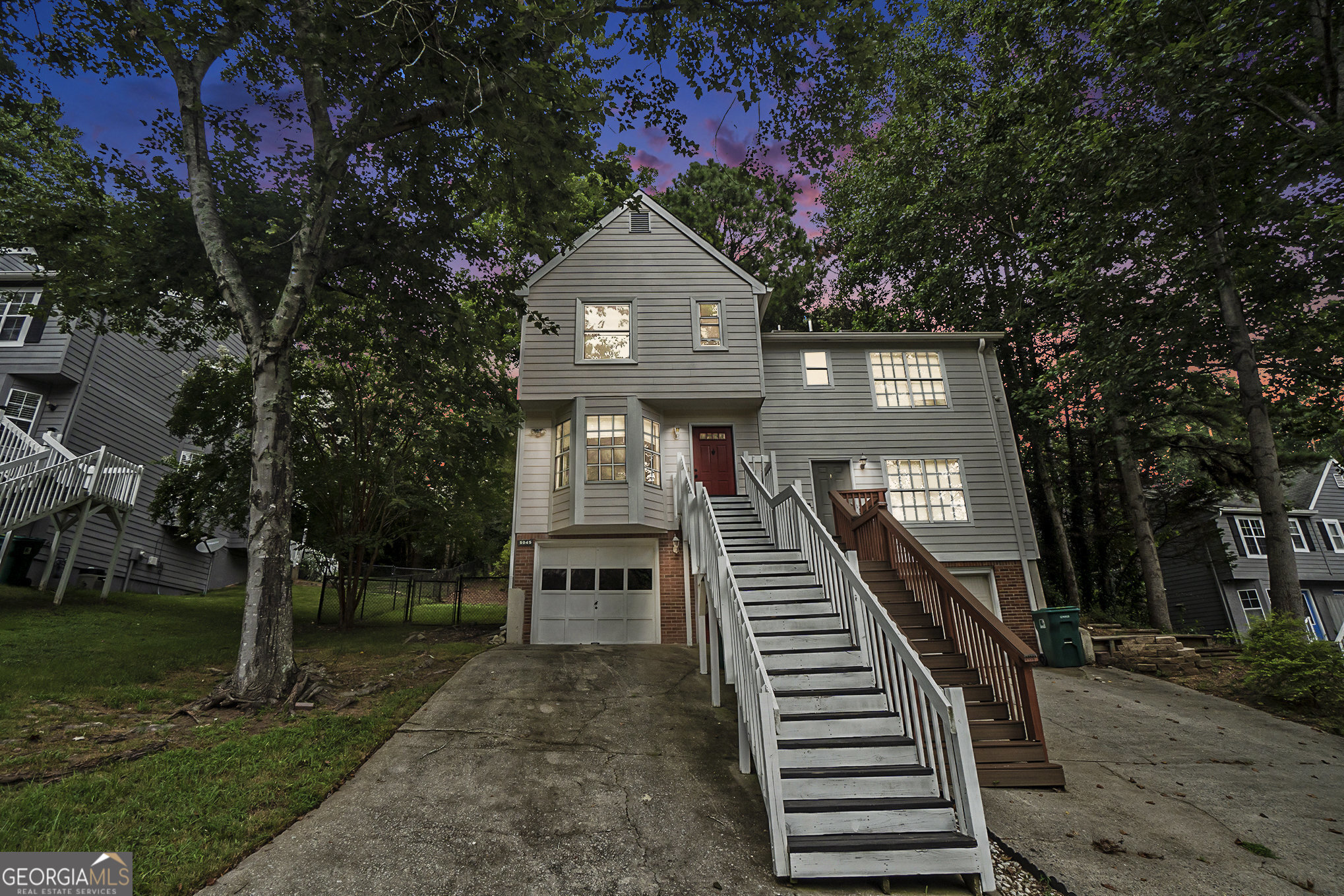 This Laurel Springs townhouse in Smyrna, Georgia, combines city and suburban living with its beautifully updated features and convenient location. The 2-bedroom, 2.5-bath home boasts a one-car garage and a fenced backyard, perfect for outdoor enjoyment. Inside, you'll find modern touches like stainless steel appliances, white cabinets, granite countertops, new light fixtures, and LVT flooring throughout. The secondary bathroom has also been recently remodeled. Located close to Truist Park, I-285, Home Depot's corporate office, and the Silver Comet Trail, this townhouse offers easy access to entertainment, work, and recreation. Laurel Springs itself is a well-maintained neighborhood praised by residents for its convenience and dog-friendly atmosphere. NO HOA.