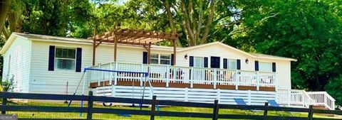 Photo of 26 Skyland Drive W, Locust Grove, GA 30248 (MLS # 10613318)