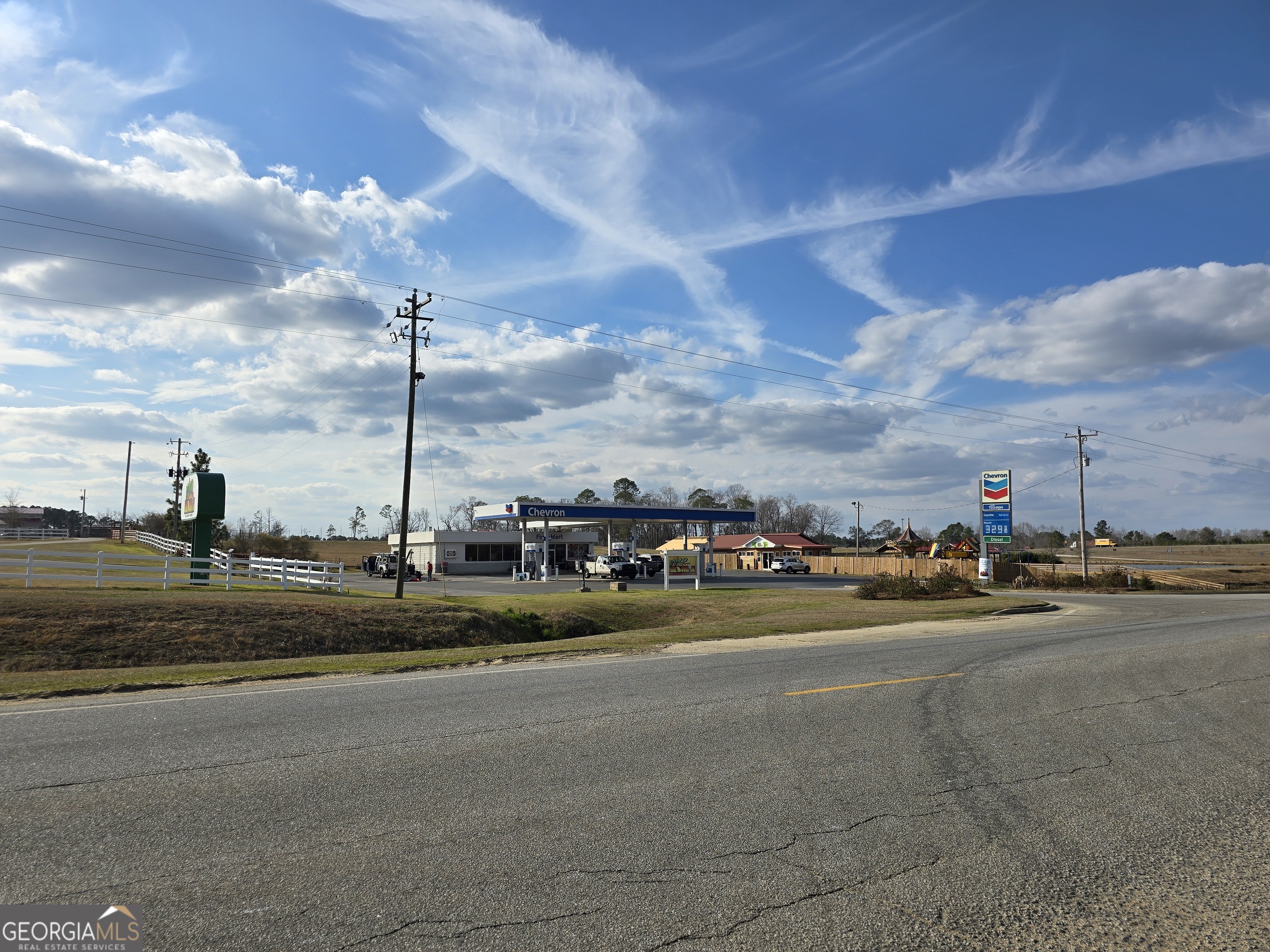 75 acres 1 hour west of Savannah on I-16 in Candler County is now available. This property is comprised of 4 parcels with 2 successful businesses including a Chevron convenience store and a wildlife safari/animal park. There is approximately 1235' frontage on Hwy 57 S, 1925' adjoining I-16, 1350' across the rear of property and 2500' on County Road Cool Springs Church Road for an additional ingress and egress needed for potential development. With the central location and proximity to the Savannah Ports, this property would be suitable for any number of commercial developments. Listing includes 4 parcels- #1-012069-Store with 1.43 Acres, #2 012 069 001 with 10.39 acres and Animal Park, #3- 012-078 10.2 acres with frontage on Hwy 57 and #4 012 079 53 acres