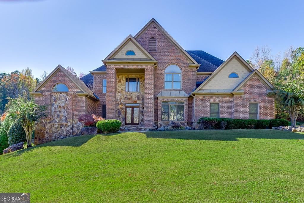 Photo of 940 Chateau Forest Road, Hoschton, GA 30548 (MLS # 10663859)