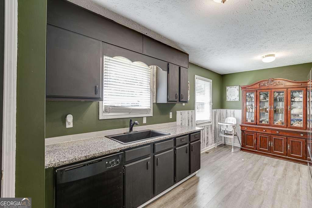 Photo of 2193 Kings Forest Drive SE, Conyers, GA 30013 (MLS # 10724935)