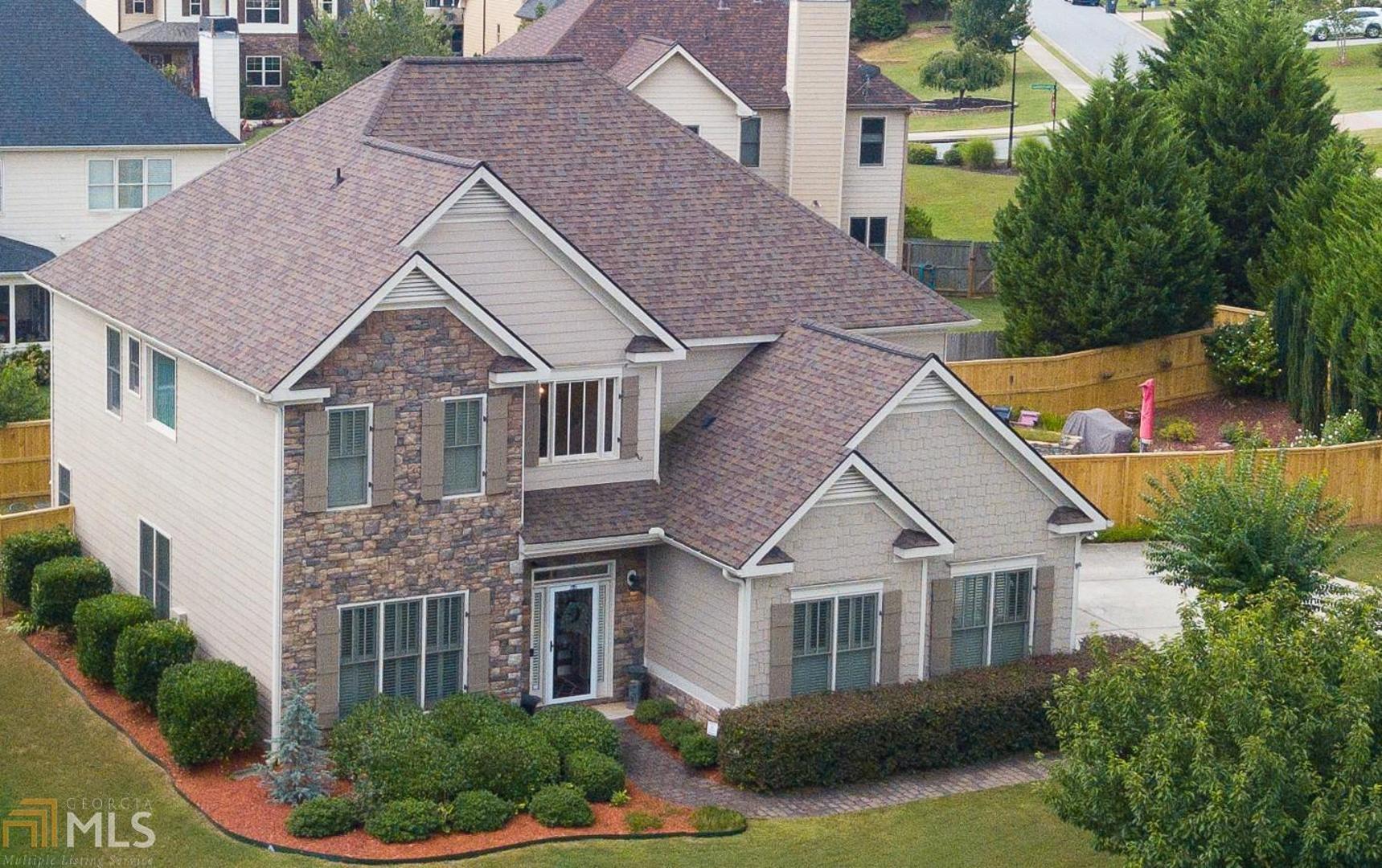 Look no further, this custom quality built home has all the bells and whistles! Backyard oasis boasts a HEATED SALT WATER pool with waterfall & covered patio great for entertaining. Dramatic 10 foot ceilings, 8 foot interior doors, upgrade appliances, granite, plantation shutters and attention to detail. Bedroom and full bath on main level offers a private retreat for teens or guests. Spacious master with large walk in closet with built in storage and separate his/hers areas. Dedicated private office on main level. Meticulously maintained and customized by owners!No sign on property.