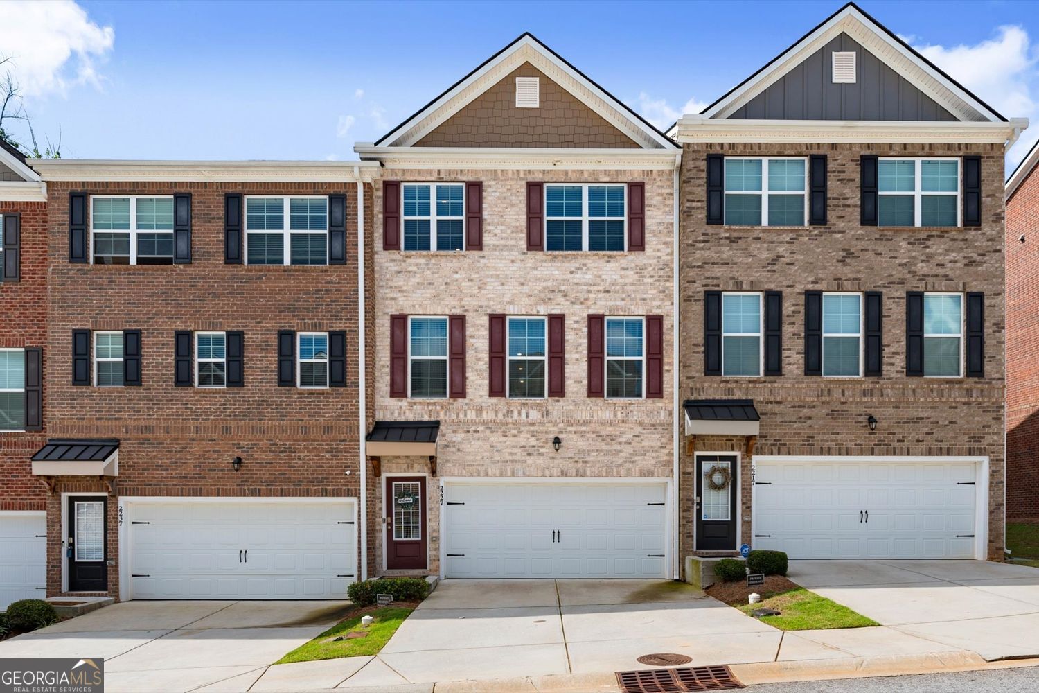 Experience Modern Luxury in the Heart of Snellville Welcome to this nearly new, meticulously designed 4-bedroom, 3.5-bathroom home, where contemporary elegance meets ultimate convenience. Situated next to the serene South Gwinnett Park and just a short stroll from the vibrant shops, dining, and entertainment of downtown Snellville, this property offers an unparalleled lifestyle. Step inside to discover an open-concept floor plan flooded with natural light, featuring high-end finishes and thoughtful touches throughout. The gourmet kitchen is a chef's dream, boasting premium stainless-steel appliances, granite countertops, a spacious island, custom cabinetry, and a walk-in pantry. The adjacent dining area flows seamlessly into the inviting family room, complete with a cozy fireplace, creating the perfect space for entertaining or relaxing. Upstairs, retreat to the luxurious primary suite, complete with a spa-inspired en-suite bathroom featuring dual vanities, a walk-in shower, and an oversized walk-in closet. Three additional generously sized bedrooms include large closets, while two share a bathroom upstairs (one would be the perfect office) and one offers a private en-suite on the main level. Outside, enjoy the professionally landscaped yard with a patio and a separate deck, perfect for outdoor dining or relaxing. The attached two-car garage provides ample storage, while the home's energy-efficient features ensure comfort and cost savings year-round. Key Features: *4 bedrooms, 3.5 bathrooms *Almost new construction with premium finishes *Gourmet kitchen with stainless steel appliances and huge island. *Open-concept living spaces with cozy fireplace. *Luxurious primary suite with spa-inspired en-suite and closet. *Deck and patio and professionally landscaped yard *Adjacent to South Gwinnett Park *Walking distance to downtown Snellville This stunning home combines modern sophistication with everyday convenience in one of Snellville's most desirable locations. Don't miss the opportunity to make it yours-schedule your private tour today!