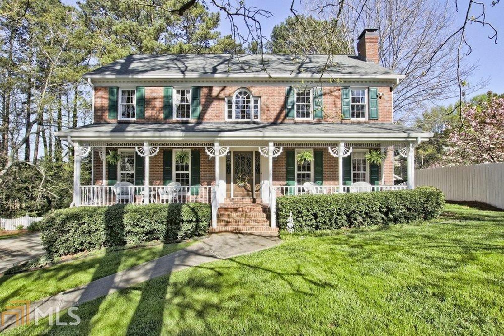 Swim/Tennis Community! Nestled in park like setting on .4 acres of land. Beautifully landscaped w/ deck & custom built gazebo. Spacious 3 sided brick home. 5 bdrm/3bath, tons of closet/storage space including a cedar closet. Home offers a large bdrm on the main level. An open kitchen w/ separate eating area & SS appliances. Lg pantry w/ Elfa shelves. Separate breakfast bar w/ a peek-aboo window. Sep dining area seats up to 10. 10ft ceiling on the main level w/ immaculate hdwd floors. Fireplaces are located thru out home in both liv/fam spaces. Front & back stairs. MUST SEE! Close to Marta.