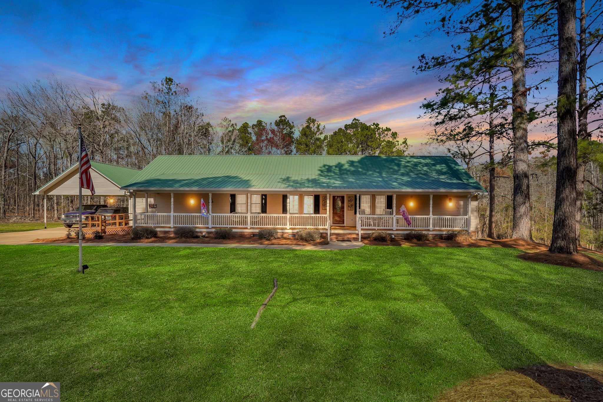 Looking for your own private country retreat? Located in Swainsboro, GA just off I-16, This 4 bedroom, 2.5 bath home rests on a large 3.02 acre private wooded lot. This family designed home has plenty of space to relax and unwind in the man cave or out back by the pool with its own cabana. Enjoy a cup of coffee and the scenic views of the well landscaped yard from the front or back porch. Inside features an open floor plan with a great room, dining area and a kitchen with a walk in pantry / laundry room that has plenty of storage for all your cooking needs. Split bedroom plan with primary on one side and guest rooms on opposite. Back bedroom adjoins a large room that could be a separate den, office or workout room. Outside you have an 18x30 RV Carport, 32x48 metal building and a 12x24 metal building that is being used as a workshop/mancave with a rear covered space for grilling and entertaining. Conveniently located near Downtown Swainsboro. Get the convenience of country living and still have easy access to Statesboro, Savannah, Macon and Augusta Ga.