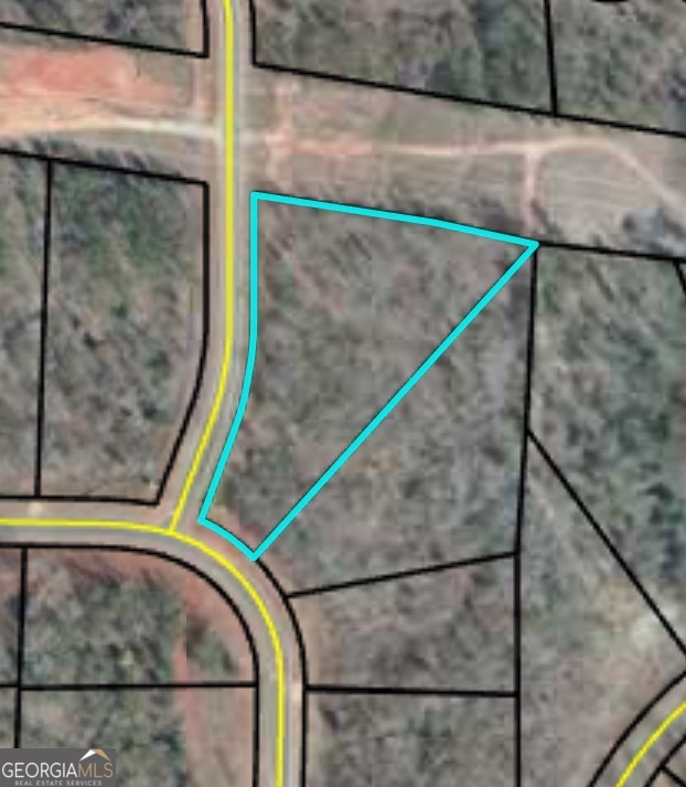 This beautiful lot offers the perfect opportunity to create your custom home in one of the area's most desirable gated neighborhoods. Enjoy resort-style amenities, including a championship golf course, clubhouse with dining, swimming pool, tennis courts, fitness center, and more. River Forest is known for its scenic views, peaceful surroundings, and strong sense of community, making it an ideal place to call home. Whether you're ready to build now or invest for the future, this lot gives you the chance to enjoy all that River Forest living has to offer. Don't miss it!