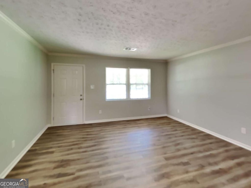 Photo of 555 Womack Road, Covington, GA 30016 (MLS # 10877630)