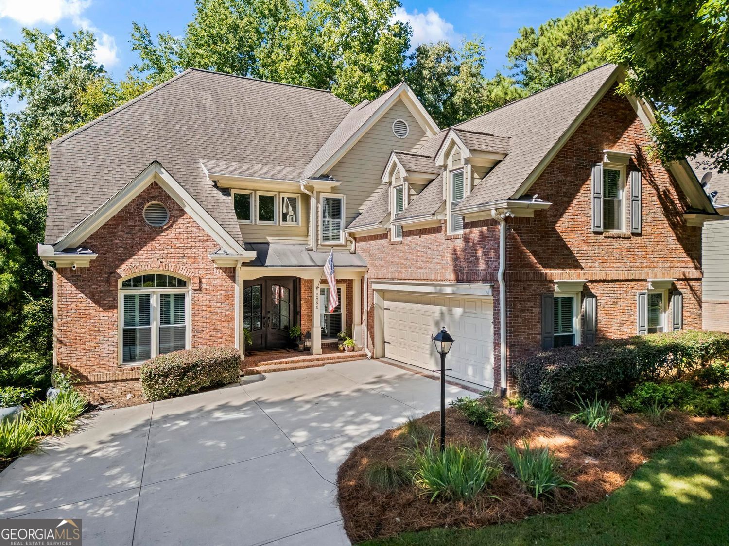 Discover a rare opportunity to own a beautifully updated home in the prestigious Windward community of Alpharetta, Georgia. Perfectly set on the 17th hole at the Golf Club of Georgia's Lakeside Course, this property combines timeless elegance, modern upgrades, and resort-style outdoor living-all within one of North Atlanta's most desirable neighborhoods. From the moment you arrive, the home makes a statement with custom castle-style front doors, refreshed landscaping, and elegant exterior lighting. Inside, the bright, open floor plan welcomes you with refinished hardwood floors, soaring ceilings, and expansive windows framing sweeping golf course views. Meticulously updated and maintained to perfection, every detail has been thoughtfully enhanced for beauty, comfort, and function. A gracious foyer opens to inviting formal living/office space with rich finishes and a spacious dining room. The chef's kitchen is the heart of the home, featuring quartz countertops, custom cabinetry, top of the line appliances, and a spacious center island with a hidden pop-up outlet-perfect for both everyday meals and entertaining. Upstairs, a large loft with built-ins provides flexibility for a home office or study area, while the renovated primary suite offers a spa-inspired retreat complete with fireside soaking tub, walk-in multi-jet shower, and custom closet systems. Two of the guest baths have been remodeled with modern walk-in showers and stylish finishes. The home's outdoor living spaces are a true highlight. A walk-out deck overlooks the lush 17th fairway, creating the perfect backdrop for morning coffee, evening gatherings, or weekend entertaining. The finished terrace level adds even more living options with a private guest suite, media and recreation rooms, a cozy kitchenette with fireplace, and a workshop/storage space. Additional features include: * Oversized garage with epoxy flooring and EV charger * Custom storage shelving throughout * Walk-out lower level with private entry Living in Windward means enjoying an unmatched lifestyle with access to Lake Windward for boating and fishing, Sports Park and optional Windward Lake Club for premier swim and tennis. Just minutes away from Top-rated Alpharetta schools, The Greenway, Avalon shopping, Restaurants, Alpharetta City Center and GA-400. SHOWINGS BEGIN TUESDAY SEPTEMBER 2ND