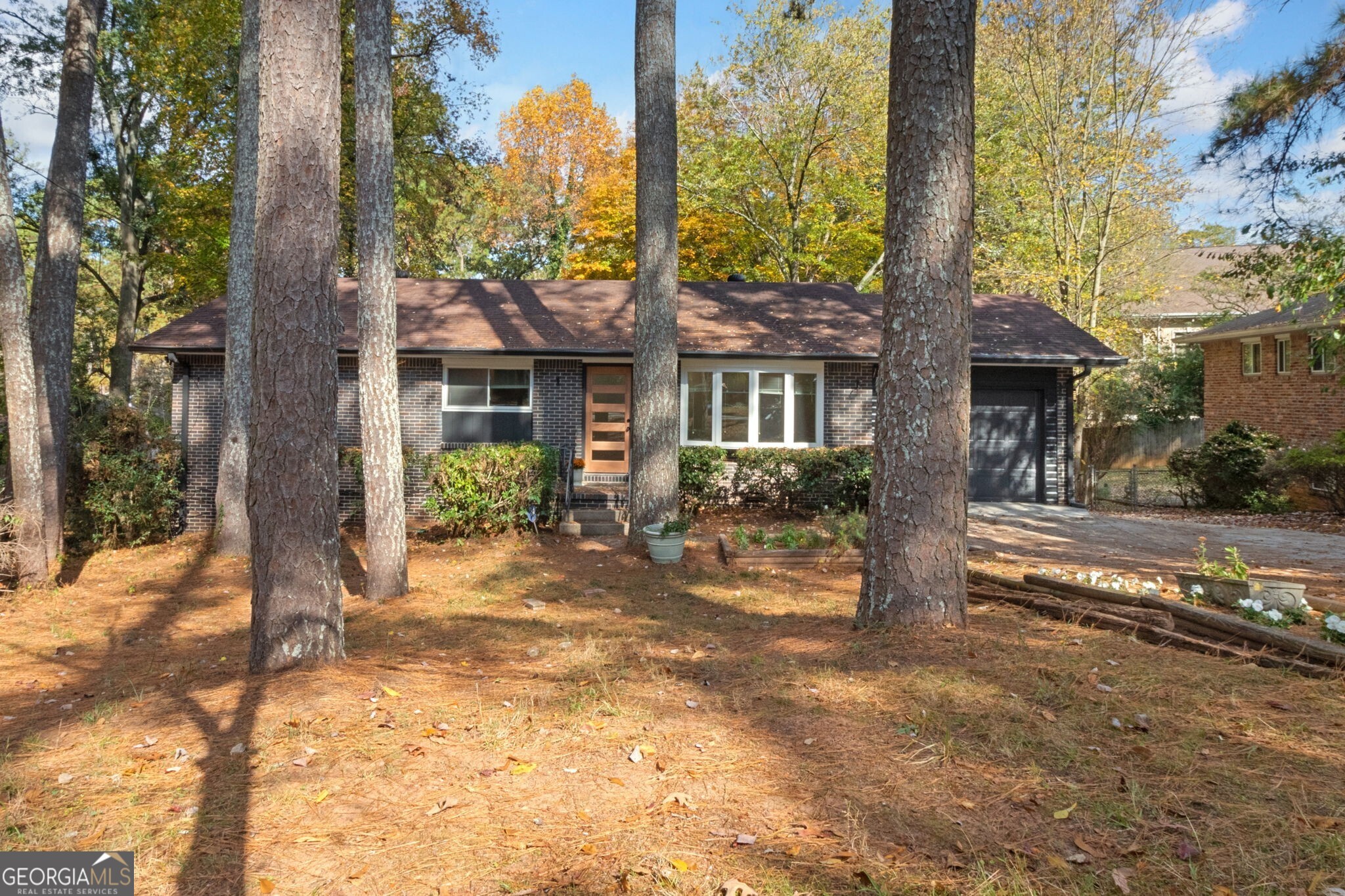 UTILITIES INCLUDED except internet. Fantastic renovation which includes gorgeous kitchen with quartz countertops with waterfall side. Custom tile backsplash, new flooring, under cabinet lighting, new stove, plenty to cabinet space and open shelving and opens to light and bright sunroom. Sunroom features tons of windows to provide natural light and opens to your new deck overlooking your private backyard. The main level bathroom is oversized and features steam shower/tub, new flooring, new vanity, new commode, hardware, lighting and mirror. The master bath is one of a kind and features walk-in shower, beautiful, oversized porcelin tile, gorgeous lighting, new vanity and commode. The terrace level features a full apartment with a separate entrance, full kitchen, new flooring in kitchen, hallway and full bath, updated countertops, living room, laundry with it's own washer and dryer, bedroom space, and it's own private patio. The terrace also features a large finished space that can be utilized as a playroom, exercise room, home office or whatever you can dream of. There is an additional huge unfished space in the terrace level that features a half bath, additional separate entrance, storage space and laundry. This space could be used as a separate office space as well. Situated on a huge, private lot. Lots of space for additional cars in the oversized, extended driveway. Minutes to Downtown Decatur, Toco Hills and Northlake Mall. Walking distance to schools, restaurants and shopping. There is a separate one bedroom basement apartment that closes off completely from the main house that is currently rented.