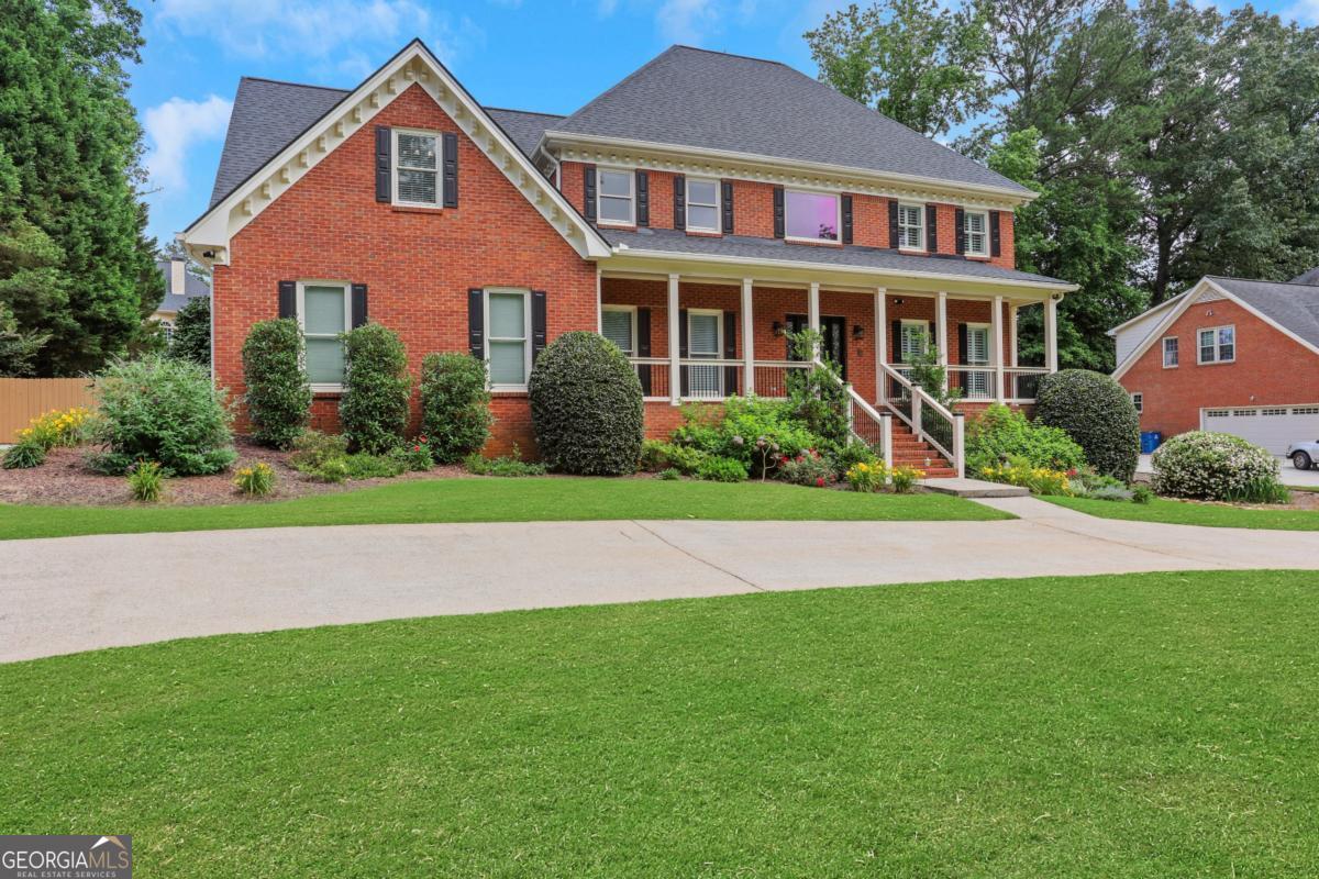 Showings start Saturday, September 20th!!! Welcome to this beautifully updated 5-bedroom home, ideally situated on a level, professionally landscaped lot in the highly sought-after Brookwood school cluster. Every detail has been thoughtfully addressed by the current owners, making this home truly move-in ready. Enjoy peace of mind with major upgrades including: new roof, updated kitchen including countertops and backsplash, renovated bathrooms, new interior and exterior lighting, Pella windows throughout the main and upper levels, two new hot water heaters, upgraded HVAC systems, additional insulation for energy efficiency, Trex deck with a screened porch perfect for outdoor living, Level 2 EV charger for electric vehicles and much more. The full unfinished basement offers abundant storage or future finishing potential. Outside, the backyard has been cleared, leveled, and sodded, and is enclosed by a new privacy fence-perfect for relaxing or entertaining. Additional improvements include fresh paint, front door, rescreened back porch, garage door & opener, new door hardware, updated outlet switches, and more. The location is outstanding-just minutes from top-rated schools, parks, popular restaurants, and a variety of shopping options, making everyday convenience a given. Don't miss your opportunity to own this exceptionally cared-for home!