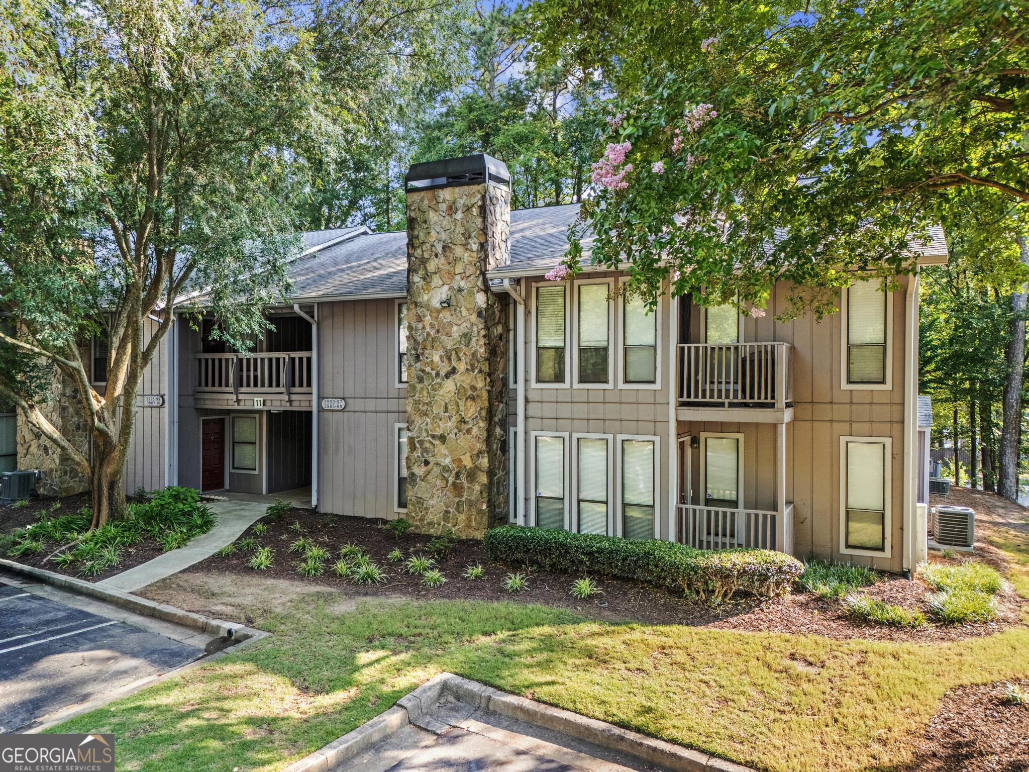 Welcome to your GROUND FLOOR, MOVE IN READY home with resort style amenities in Tucker! This charming condo offers a perfect blend of style and comfort, boasting 2 spacious bedrooms and 2 pristine bathrooms! It's the perfect roommate floor plan! Step inside to discover luxury vinyl floors in the living area and freshly painted interiors that create a MODERN and inviting atmosphere. The kitchen is a culinary delight, featuring sleek quartz countertops and stainless-steel appliances, ideal for those who love to cook and entertain. The laundry room has pantry storage right off the kitchen. The living area is OPEN CONCEPT, complemented by a dining area, office or sunroom and a cozy fireplace. BRAND NEW hot water heater and maintained HVAC keep you living the good life, worry free! Custom Ikea closet in the primary bedroom and professionally cleaned carpet in each bedroom. Enjoy morning coffee and watch the birds from your private back porch. With updates and wonderful AMENITIES to foster health, wellness and community, this home offers everything you need for comfortable living. Don't miss the opportunity to make this delightful residence your own! Convenient to downtown Main Street Tucker, historic Norcross, Kelly Cofer Park, Embry Hills, Heritage Golf Links, I-85, 285 and Marta. Listing agent is one of the owners of the property.