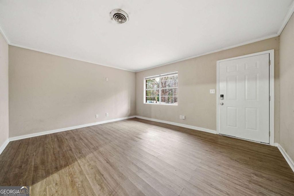 Photo of 6401 Raymond Ter, Union City, GA 30291 (MLS # 10654622)