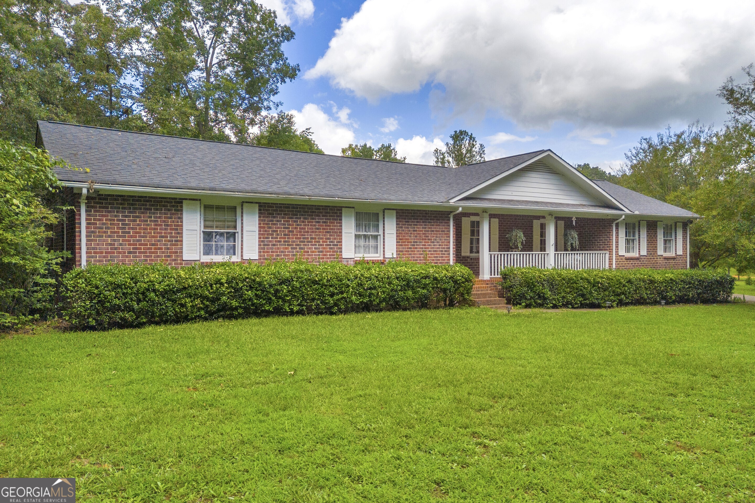 Nestled in a nice and quiet neighborhood, this well-maintained home offers charm, functionality, comfort and convenience! This 4 BR classic brick home insures low maintenance & long-lasting durability. Kitchen has an open plan to the dining area, making entertaining friends and family more convenient. The inviting living room has a cozy fireplace, perfect for movie watching or snuggling up with a book on cool days. While there are four generous sized bedrooms, you'll also enjoy the very spacious bonus room, perfect for enjoying hobbies & crafting, or make it a 5th BR. Outside you will find a private pool oasis, just what you need to float away all your stress. Additional storage shed is great for lawn equipment, storage, etc... This nice level lot has ample privacy and plenty of room for the kids and pets to play. Location is excellent, as schools and businesses are just minutes away, as well as the convenience of Athens. Call today and let's start moving!