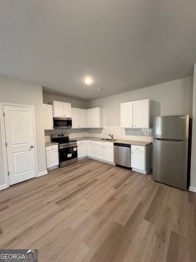 Photo of 1171 Pinedale Circle NW, Conyers, GA 30012 (MLS # 10879516)