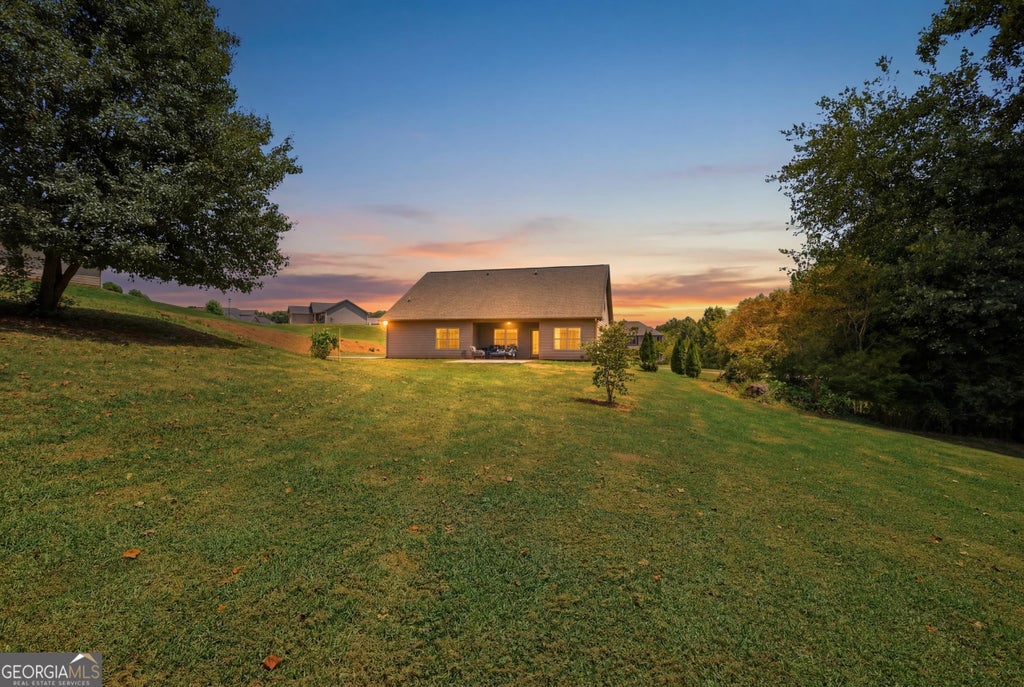Photo of 5911 Wauka Valley Pass, Clermont, GA 30527 (MLS # 10803678)