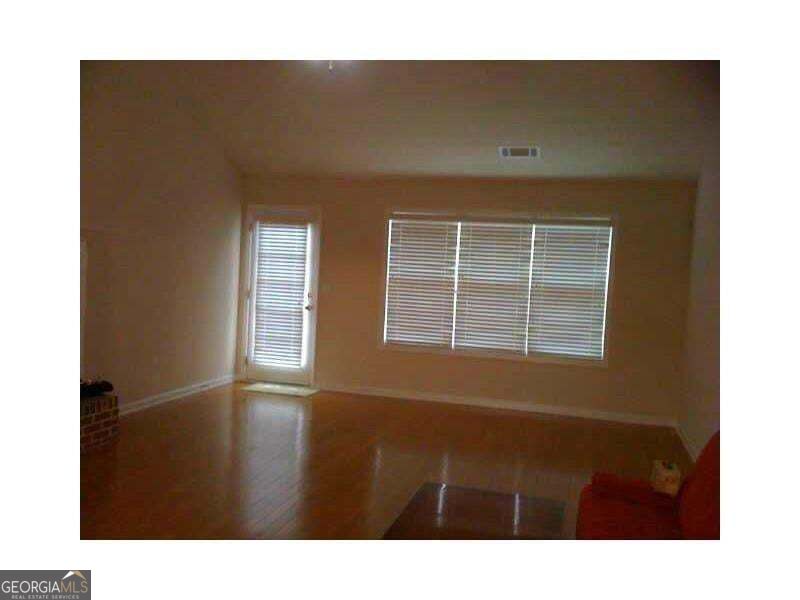 Photo of 3555 Stoneleigh Run Drive #3555, Buford, GA 30519 (MLS # 10874941)