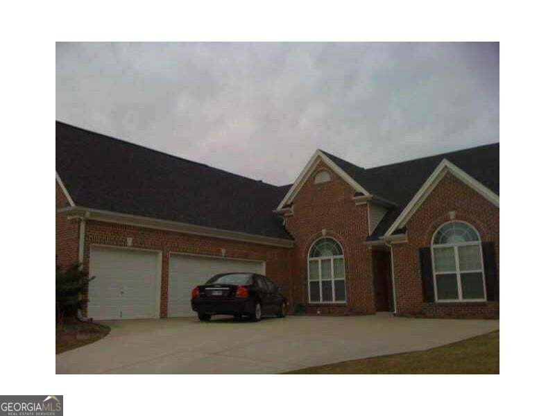 Photo of 3555 Stoneleigh Run Drive #3555, Buford, GA 30519 (MLS # 10874941)