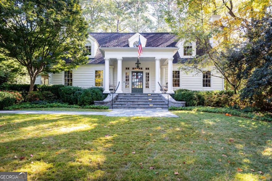 Remarkable details by Norman Askins and Susan Bozeman make this Haynes Manor  home a masterpiece.  Walk through the front door and there is a clear view all the way through the home to the meticulously planned and executed, flat, walkout  back yard.  Renovated in 2019 with an open floorplan from a beautiful kitchen, breakfast area and family room, all that flow seamlessly onto the back covered patio with a fireplace  and a perfect sized yard. The varnish quality, high gloss paint on the front library/den sets the tone for the quality throughout. A fireplace anchors both the den and the formal living room. Fine fibered, grass cloth lines the  elegant and quaint dining room. The very best appliances, including Sub-Zero refrigerator/ freezer, Kitchen Aide double ovens, Bosch dishwasher and Meile steam oven serve this kitchen that is designed for an open gathering oriented, comfortable space for everyone. Iron doors open from the family room to  the covered outdoor patio with slate floors and a fireplace  that essentially add to the living area of this home.  A  main level guest suite makes for great privacy. With a wide stairway leading upstairs,  the second floor has a primary bedroom suite that is filled with natural light from every angle. What a wonderful way to start and end your day with an eastern facing primary bedroom,  marble lined bathroom and a large walk in closet.   Two other  spacious upstairs bedrooms each have their own bathrooms and  closets.  There are some auxiliary amenities that make day to day life at this home a joy.  The two car garage is steps away from the friends side entry to the home. The generator is  ready to keep you safe and comfortable if the power goes out.  All this luxury is steps away from three of Atlanta's greatest assets: the Bobby Jones Golf course , the Bitsy Grant Tennis center and the beltline walking path. You just cannot beat the lifestyle combination  and luxury this quality home offers.